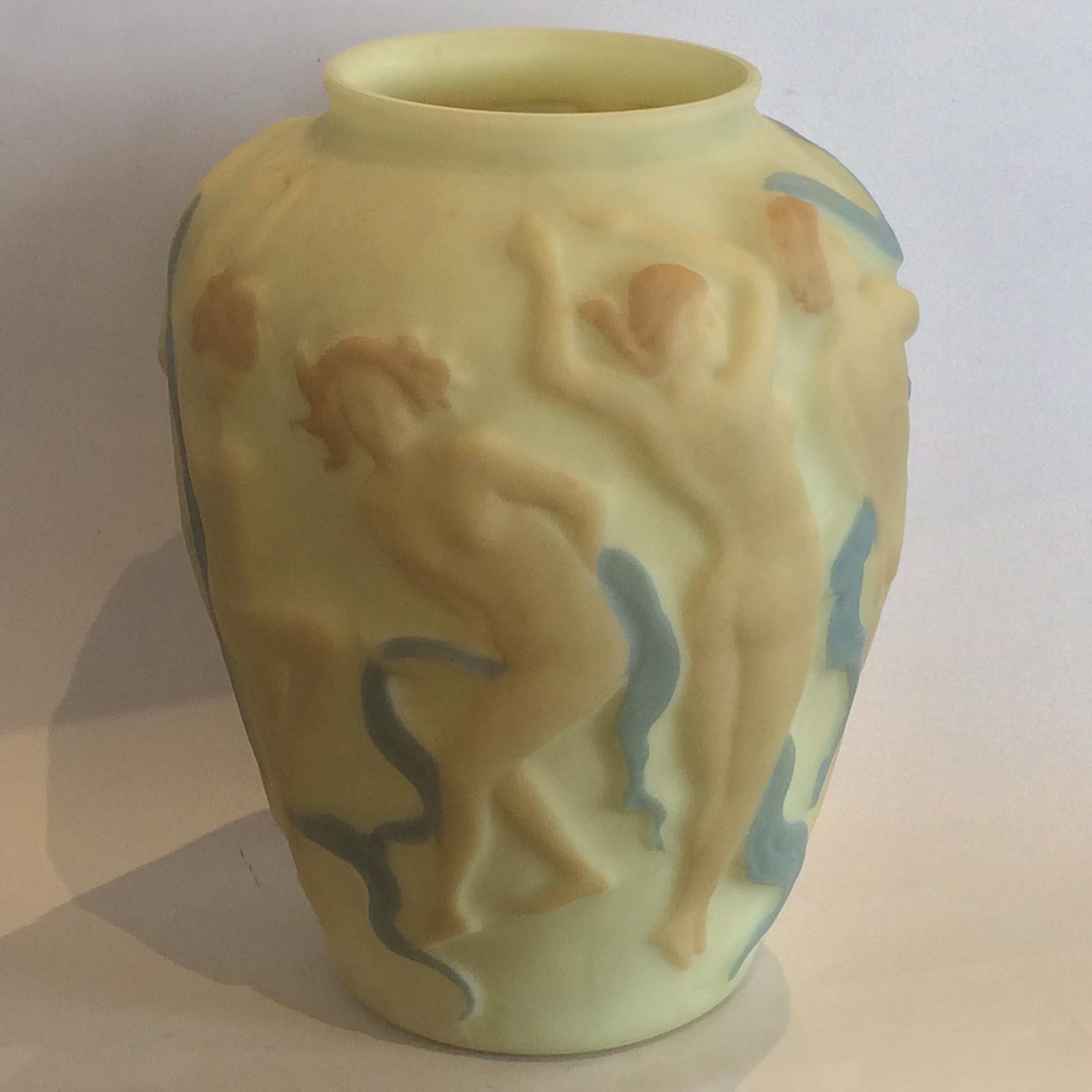 Art Deco, huge vase of nudes dancing and satyr playing, by Consolidated Phoenix Glass Company. Vase is in the rare five colors version, and consists of seven nudes dancing in various positions, to the music played by the satyr with a “Pan” flute.