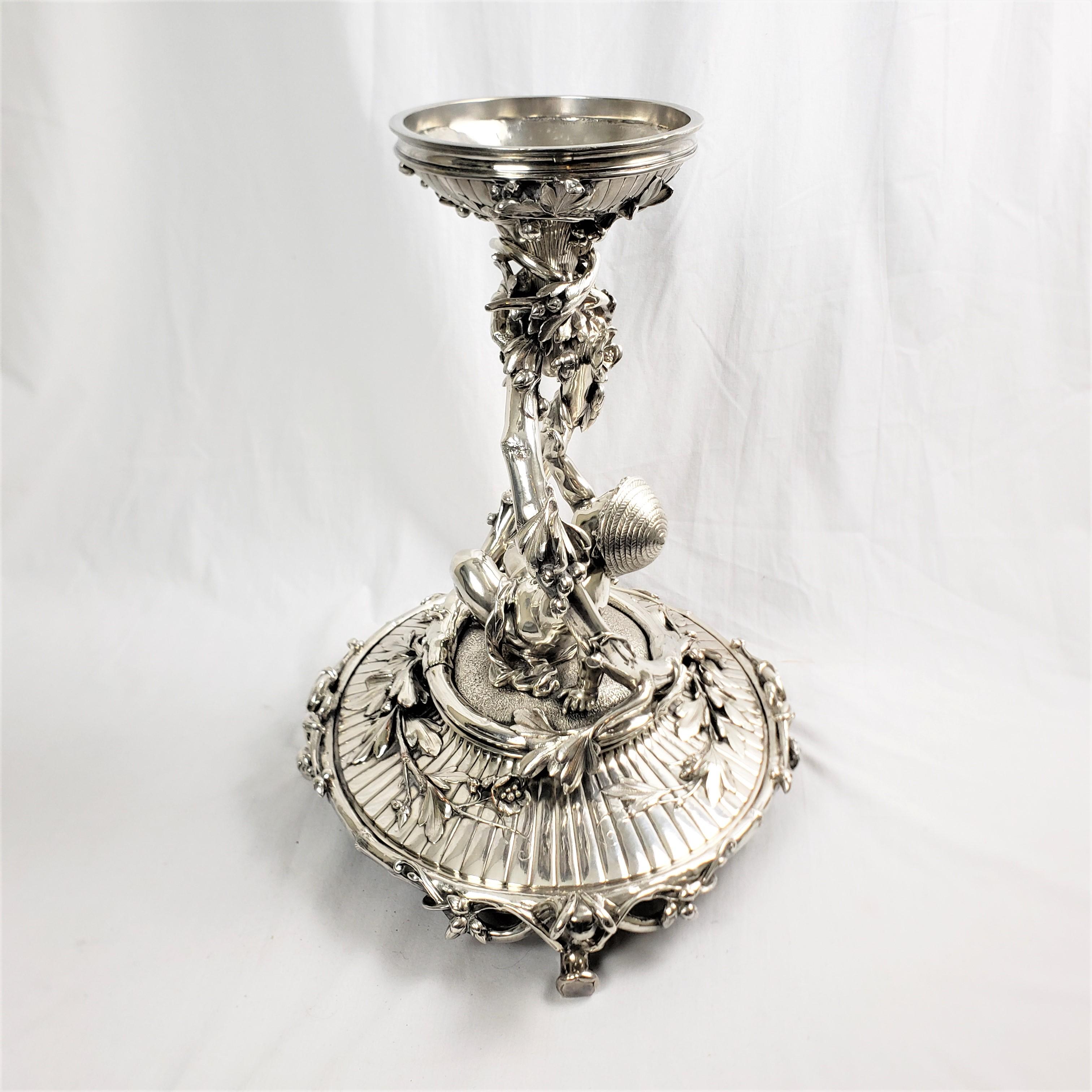 High Victorian Huge Antique Christofle Silver Plated Centerpiece with a Figural Reclining Child For Sale