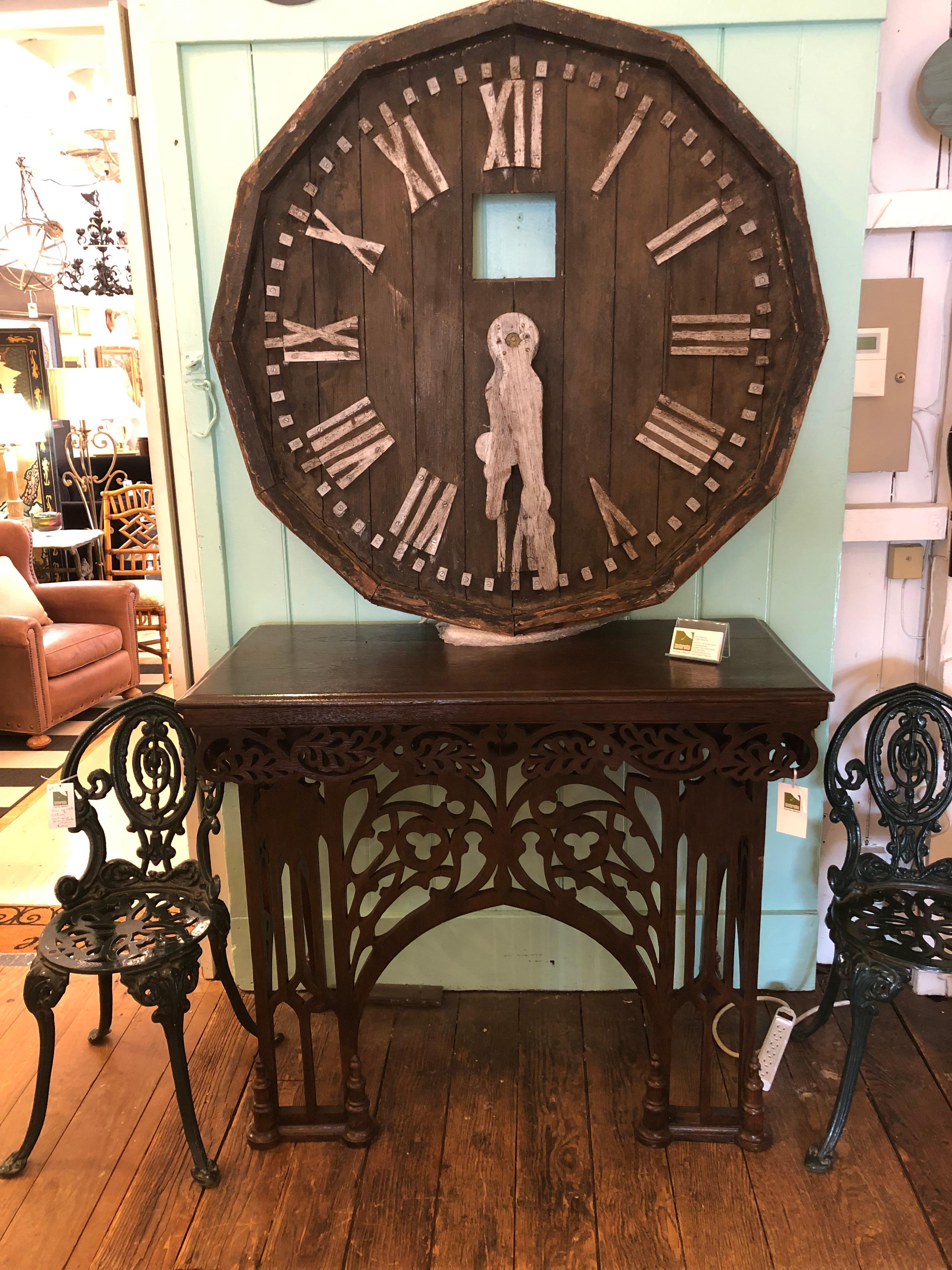 Strikingly large architectural found clock face having distressed wood with tons of character.  Must have worked at one time, as there is an electrical box affixed to the back which we are selling as is.  Makes a great wall sculpture and found