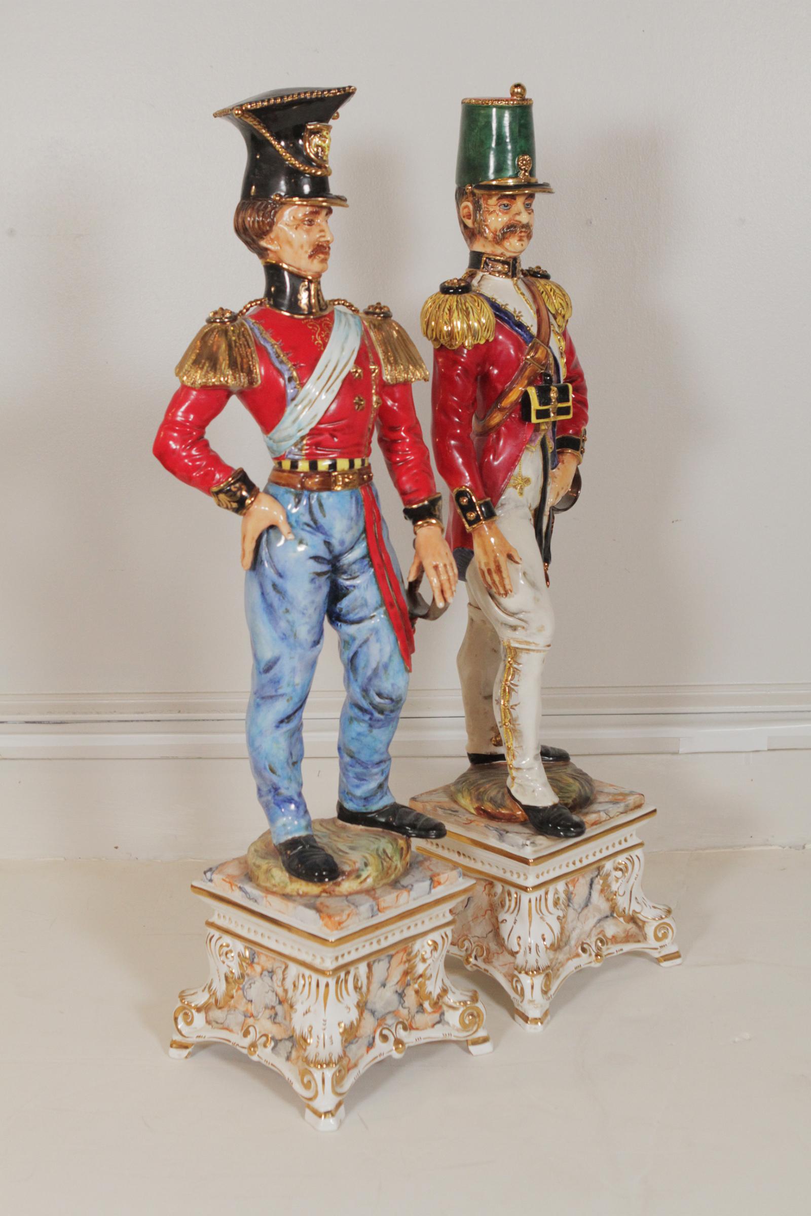 Huge antique pair of 37” tall porcelain soldiers, made in Italy circa 1870-1880 by Bartolomeo Gassio. Dimensions: 37” x 9.5”
The first titled Carabineer, the second, Sargent of Piedmont Guard. Bartolomeo worked in Naples from 1865 to 1913.
 