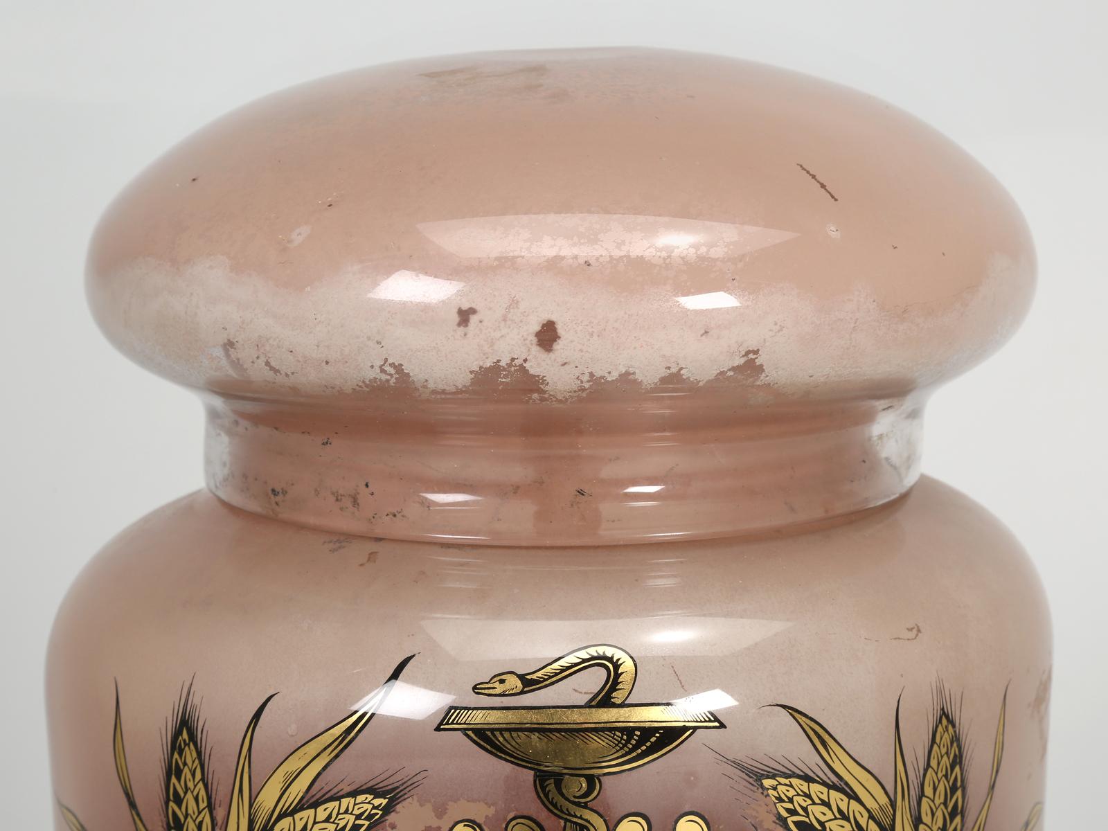 Huge reverse hand-painted (Verre églomisé*) antique Apothecary Jar which appears to be signed; A. Collier Paris. These highly decorative and overscale glass jars were commonly found in the finer pharmacist establishments around 1900. Papaver, as