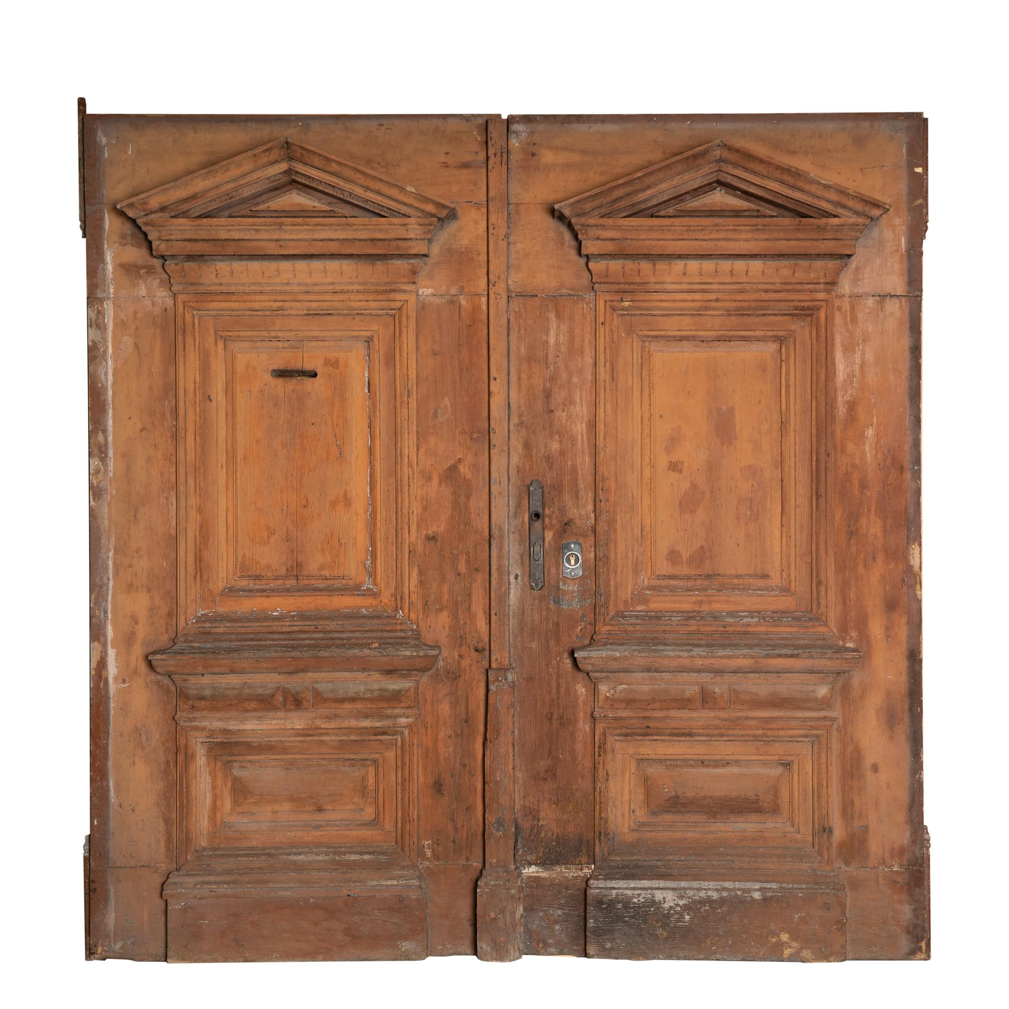 This massive pair of painted doors make an impressive architectural statement standing 12.5' tall with the arched transom included.
Sold in original used condition, wood is solid/stable. All nicks, gouges, separations, distress, abrasions,