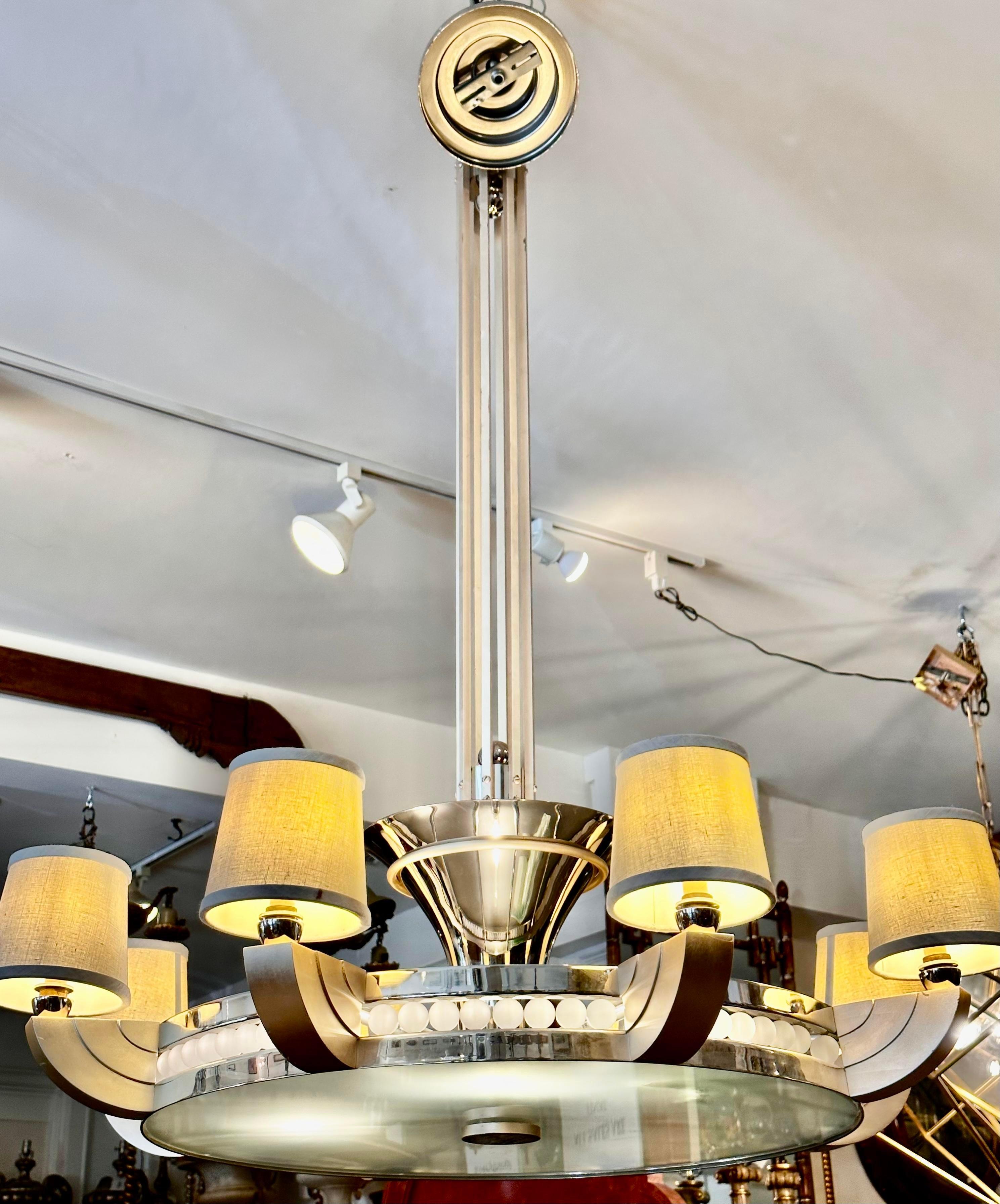 Huge Art Deco Sally Sirkin Lewis for J Robert Scott Odette Chandelier. It is the larger example with linen shades.