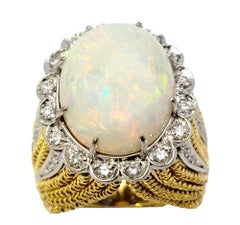 Huge Cabochon Opal Cocktail Ring with Diamond Halo in 18 Karat Yellow Gold