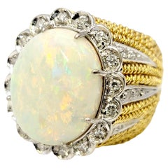 Vintage Huge Cabochon Opal Cocktail Ring with Diamond Halo in 18 Karat Yellow Gold