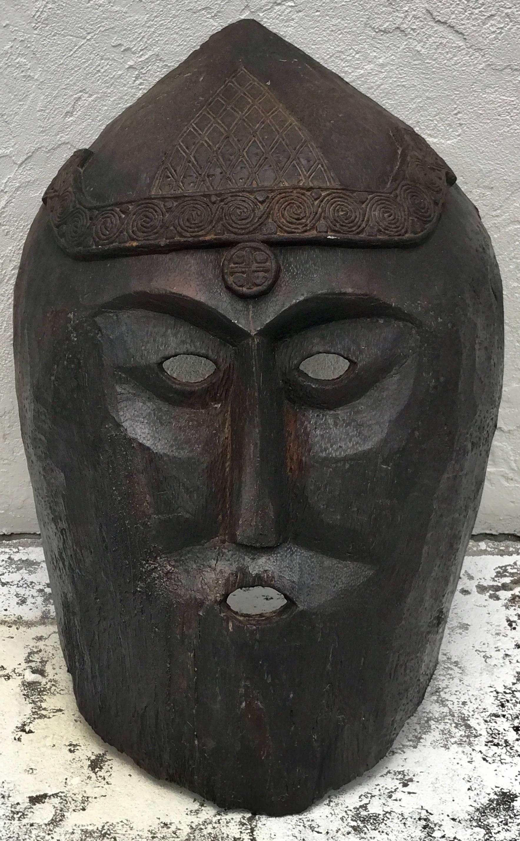Huge carved mahogany Celtic mask, 20th century or older.