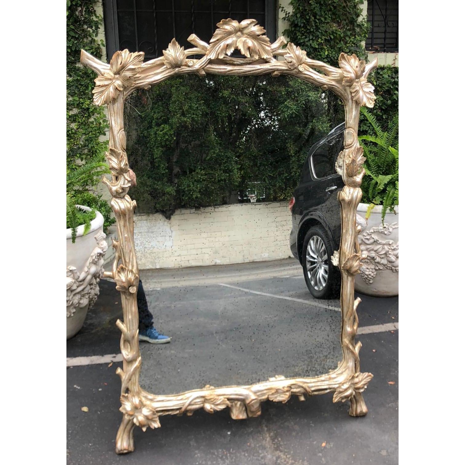 Huge carved silver-leaf designer mirror W grapevine & leaf by Charles Pollock.