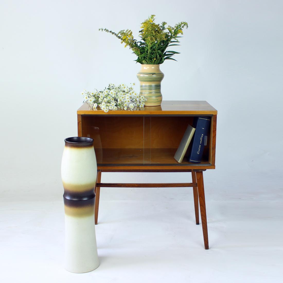 What a beast! This beautiful vintage vase is a definitely a stand out! It is hard to miss in any interior and hard not to love, too. Produced by Dittmar Urbach in 1960s, the original stamp is still visible in the bottom. The vase is made of ceramic