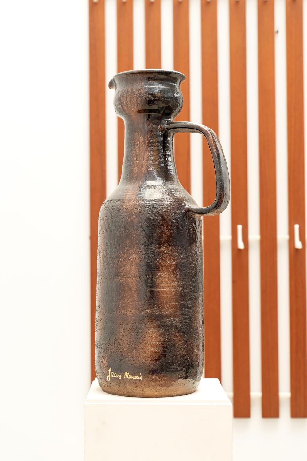 Huge Jean Marais (1913-1998)  vase or pitcher  in brown glazed ceramic, with a baluster-shaped neck. 
Signed.

Please do not hesitate to contact us for any additional information. We would be delighted to assist you in any way we can.
