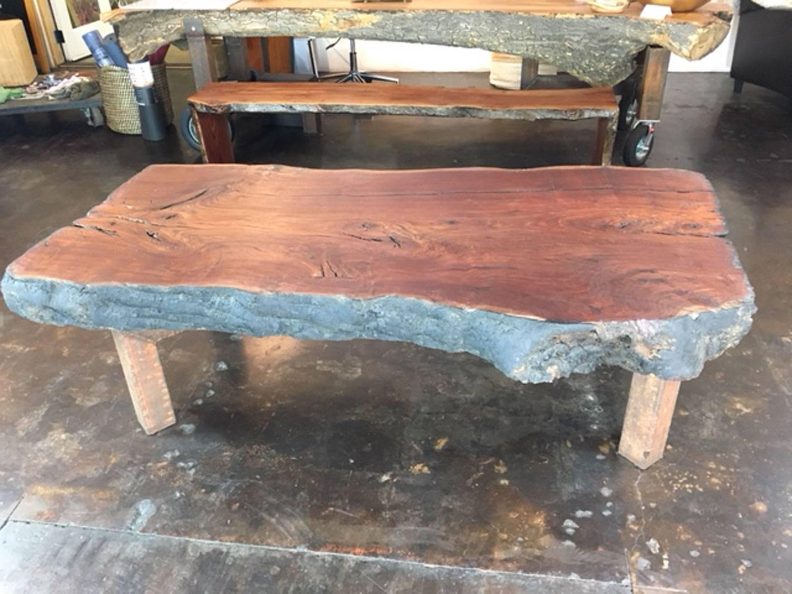 Huge organic shaped coffee table or display table designed, produced and made by master wood artist and designer Scott Mills who only uses reclaimed (deadfall or storm downed trees) in the pieces he designs and produces. This piece is big, solid,