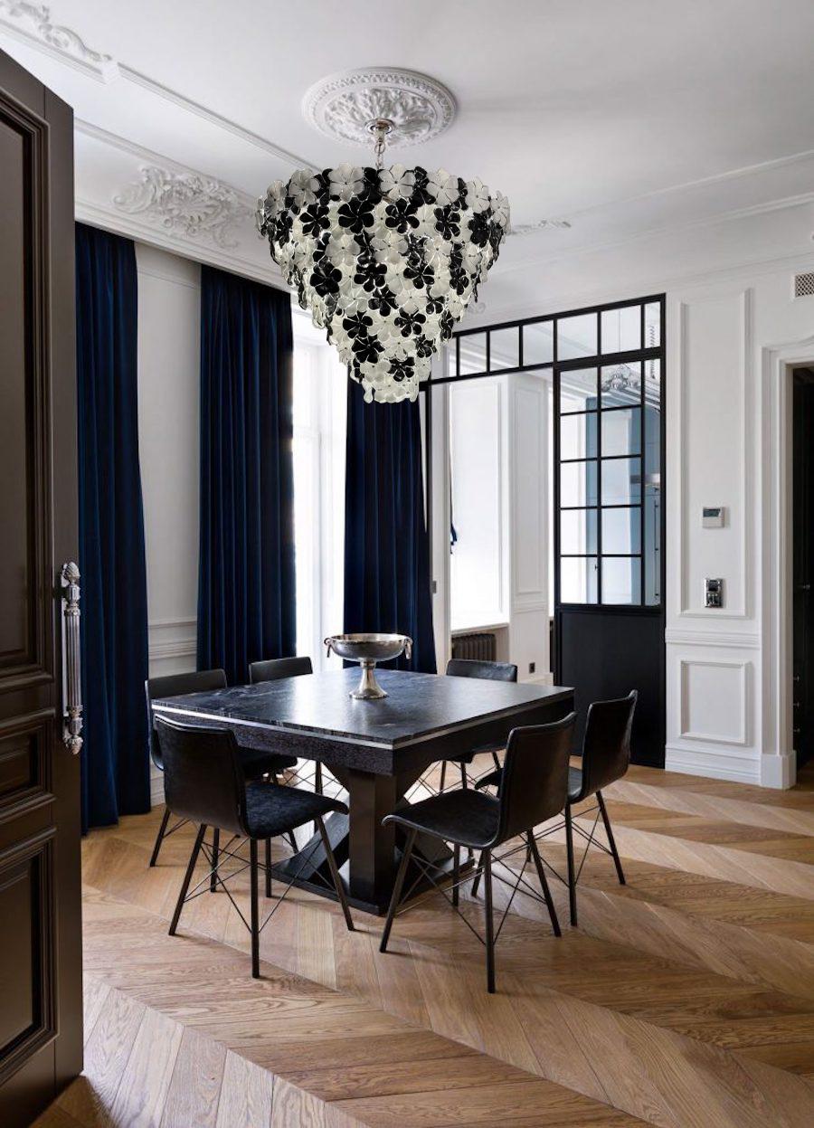 Striking contemporary Murano glass chandelier composed by dozens black and White  hand blown flowers by  Veneziani Arte.
Available also a pair.

This light fixture can be disassembled and the glasses individually wrapped for easy transport. We will
