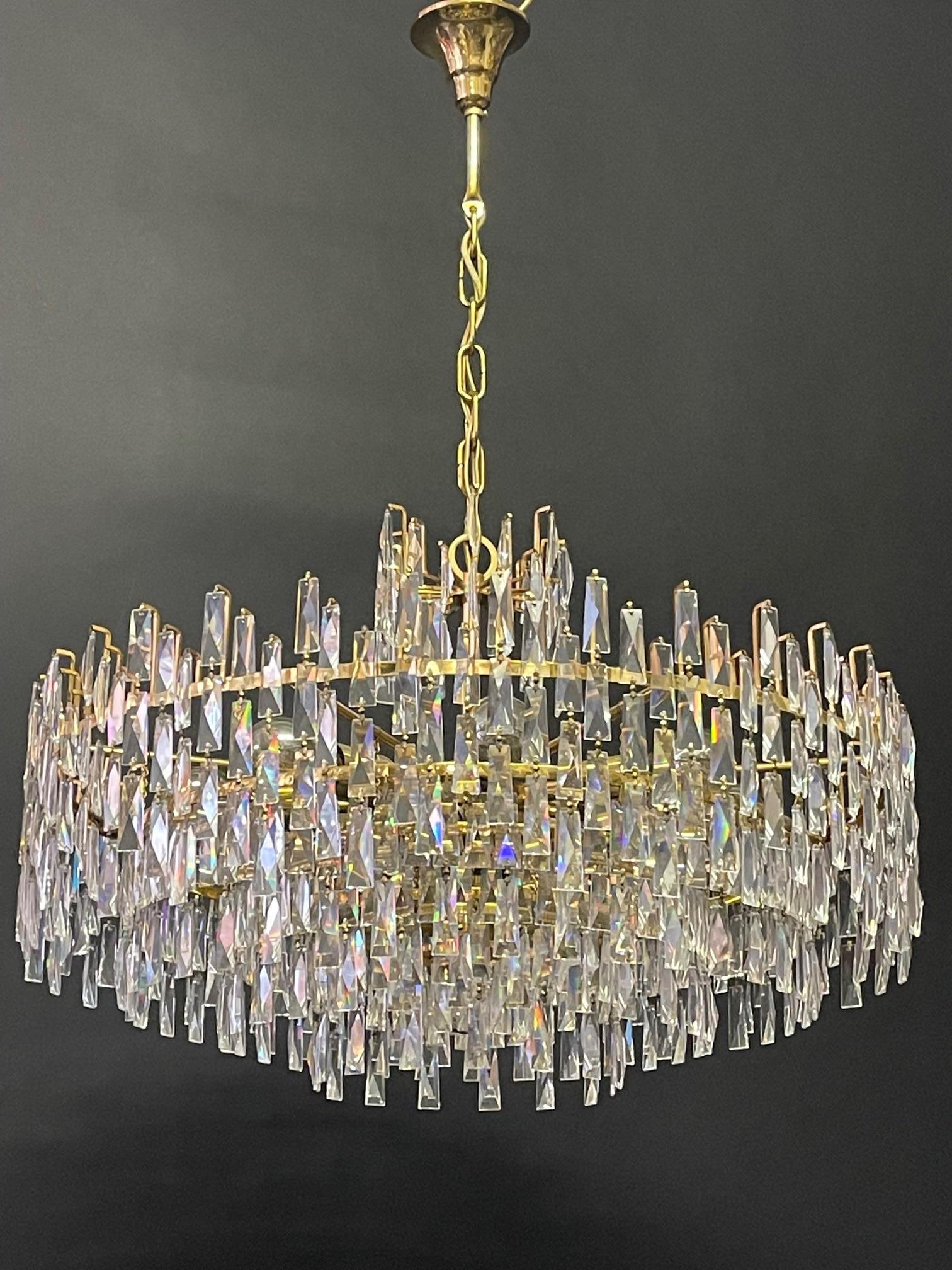 Huge mid - century brutalist style gilt brass and crystal chandelier by Palwa, Germany, circa 1960s.

Socket: x e14 for standard screw bulbs.

 