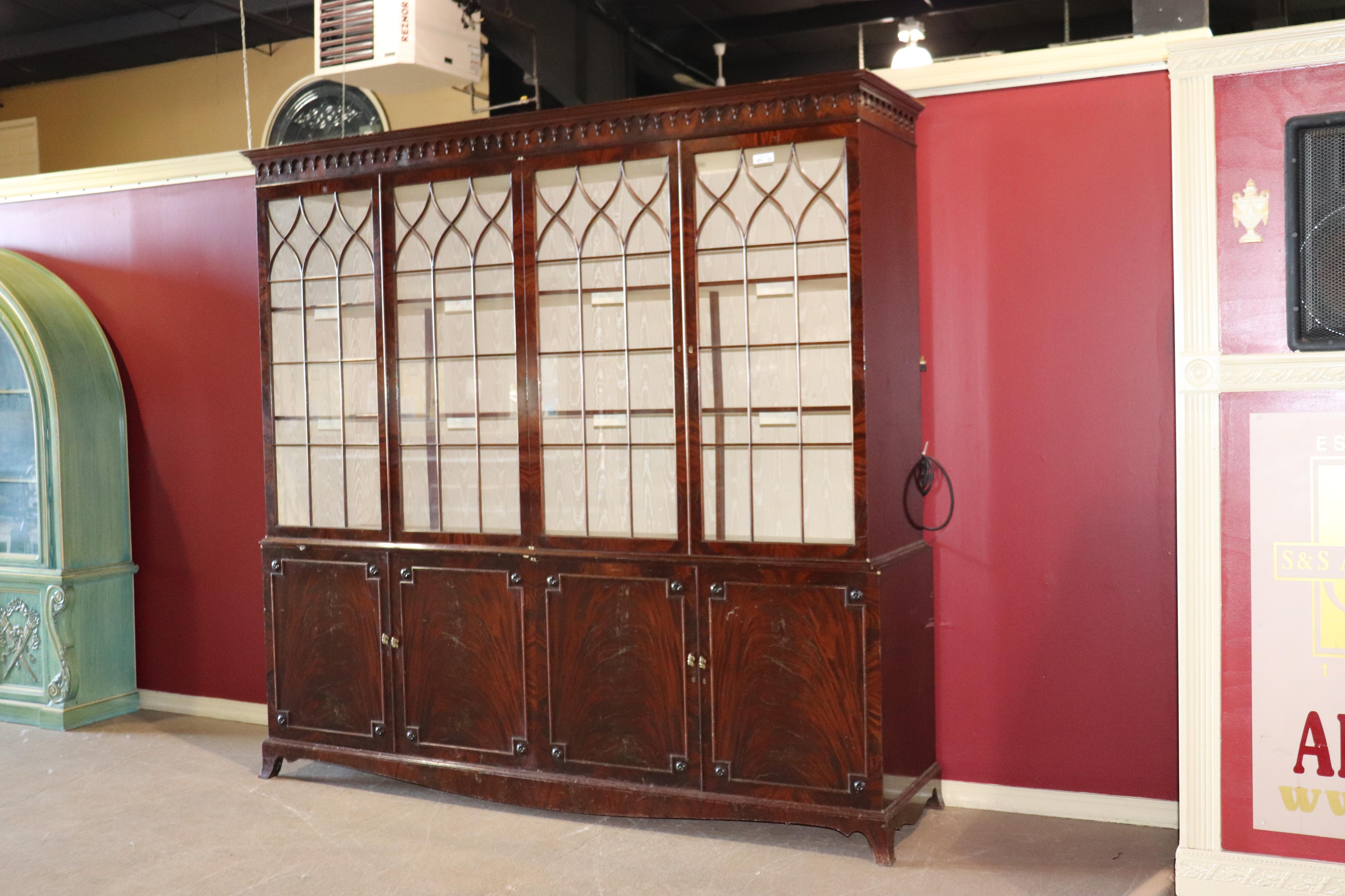 This is an enormous custom made breakfront that will need some finishing and work, but may just be perfect for a person that is considering making a custom made wall bookcase, circa 1930. For a relatively small sum of money, this can be