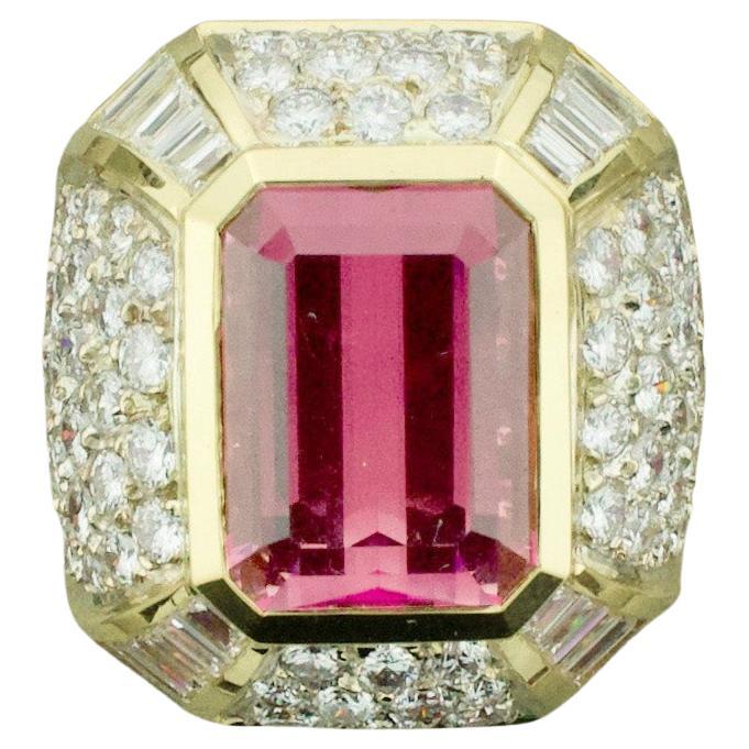 Introducing the Huge Diamond and Pink Tourmaline Ring in 18k - the ultimate statement piece that will leave your friends and enemies in awe. Crafted from 18K yellow and white gold, this ring is adorned with 82 round brilliant cut diamonds totaling