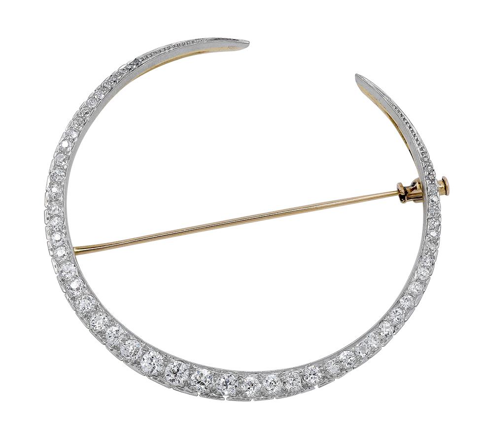 Extra-large size figural crescent moon pin.  Encrusted with old-European cut diamonds., approximately 2.00 carats in weight.   Set in 14K yellow and white gold.  2  1/3