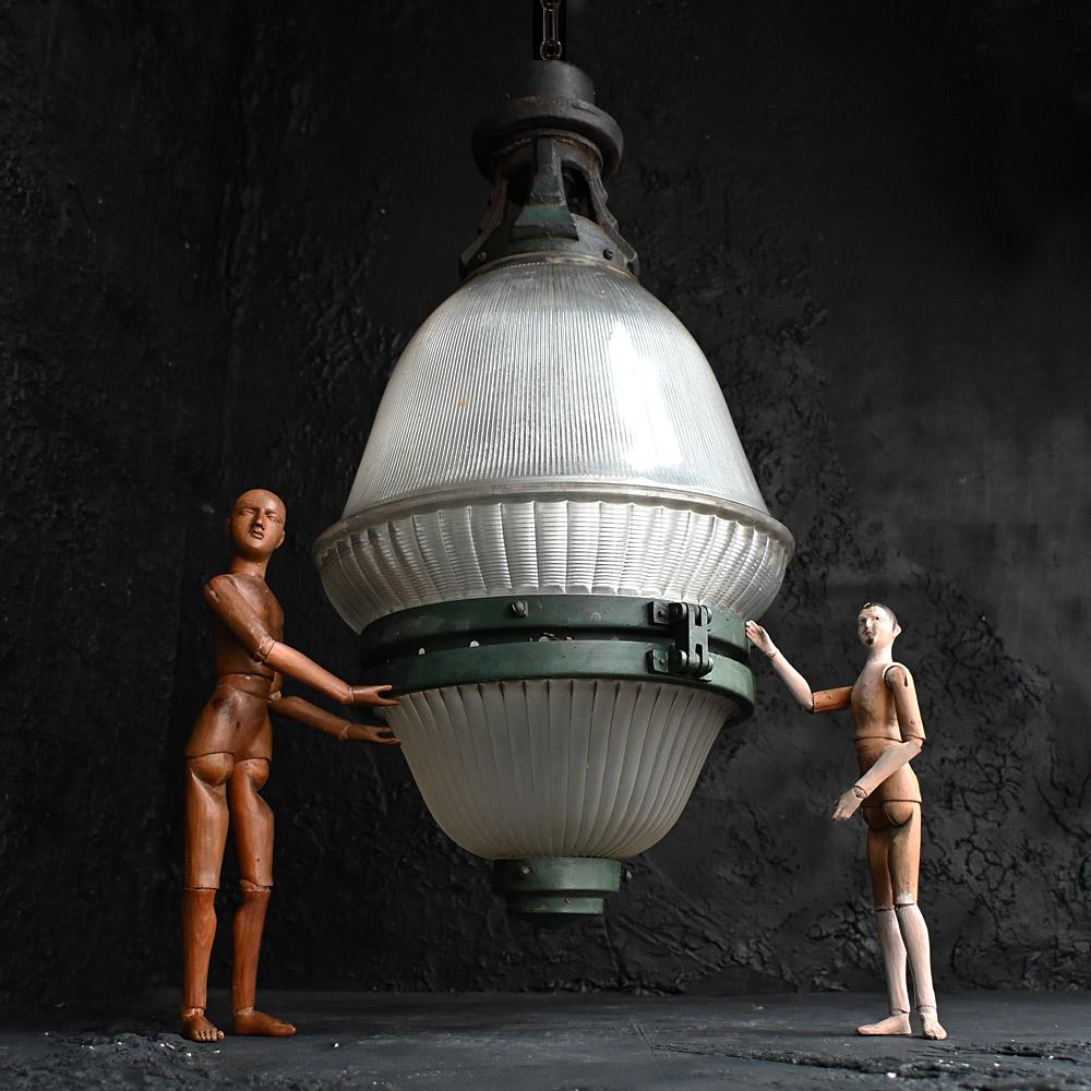 Huge Early 20th Century French Holophane Light 
One of the largest French Holophane lanterns we have had the pleasure to uncover.  Weighting close to 30kg and standing 30 inches tall, this enormous light is quite a statement piece. Made from cast