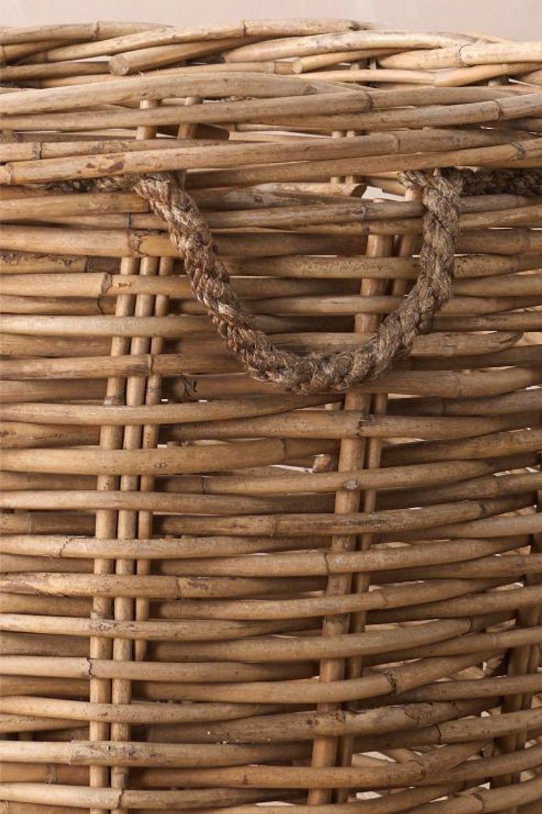 This is a great looking extremely large early 20th century wicker mill basket. Great condition and sturdy. It is slightly leaning to one side but all part of the character and charm. Original rope handles and great patina overall. Ideal for large