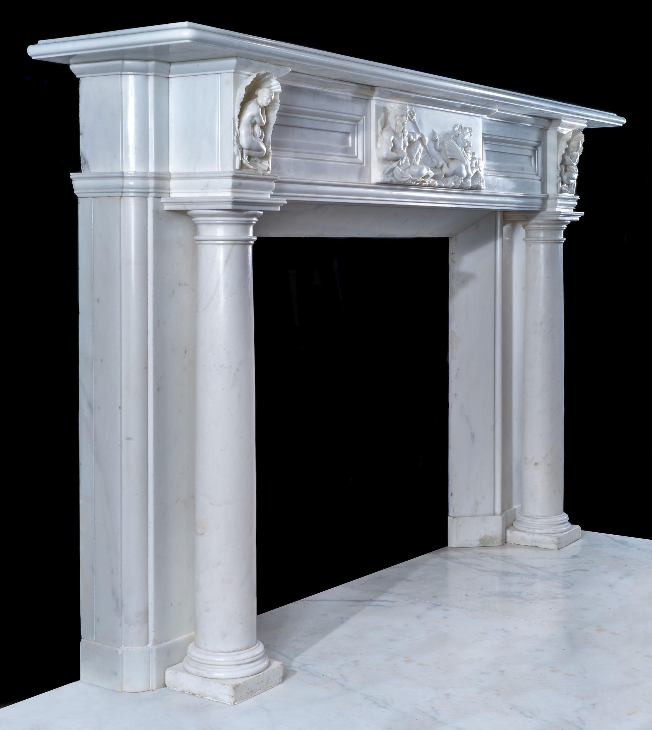 A rare Irish chimneypiece of grand proportions in statuary marble. The generous moulded shelf rests over a wide panelled frieze which is mounted with a tablet of exceptional quality. It depicts a recumbent Poseidon, god of the sea, being drawn on a