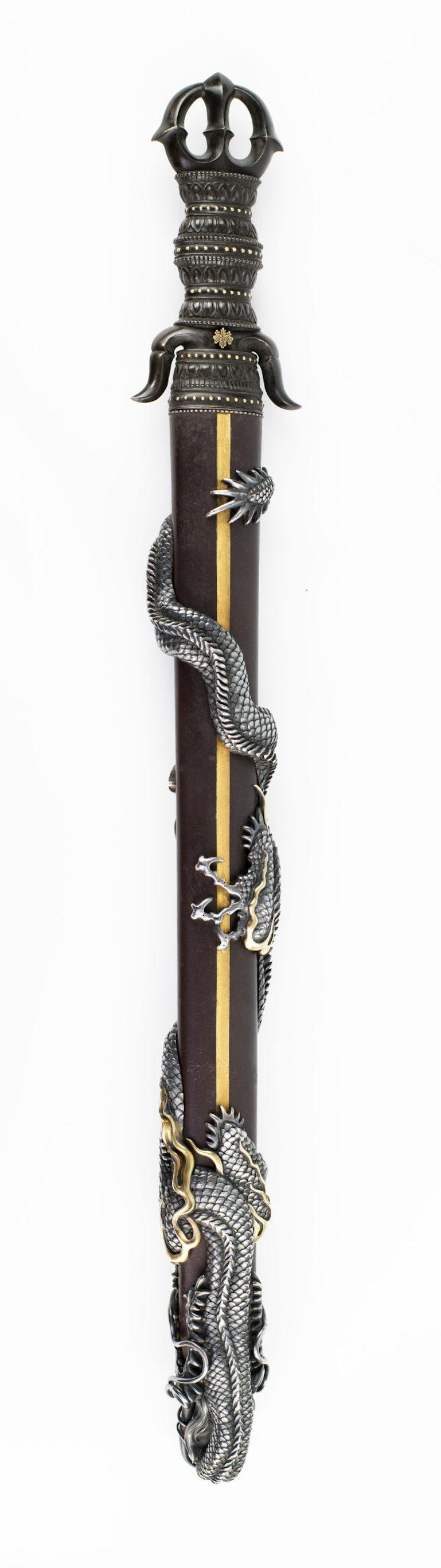 As part of our Japanese works of art collection we are delighted to offer this exceptionally large and fine Meiji period 1868-1912, mixed metal mounted O- Tanto Wakizashi ,the iron scabbard mounted with an entwined silver dragon of exceptional