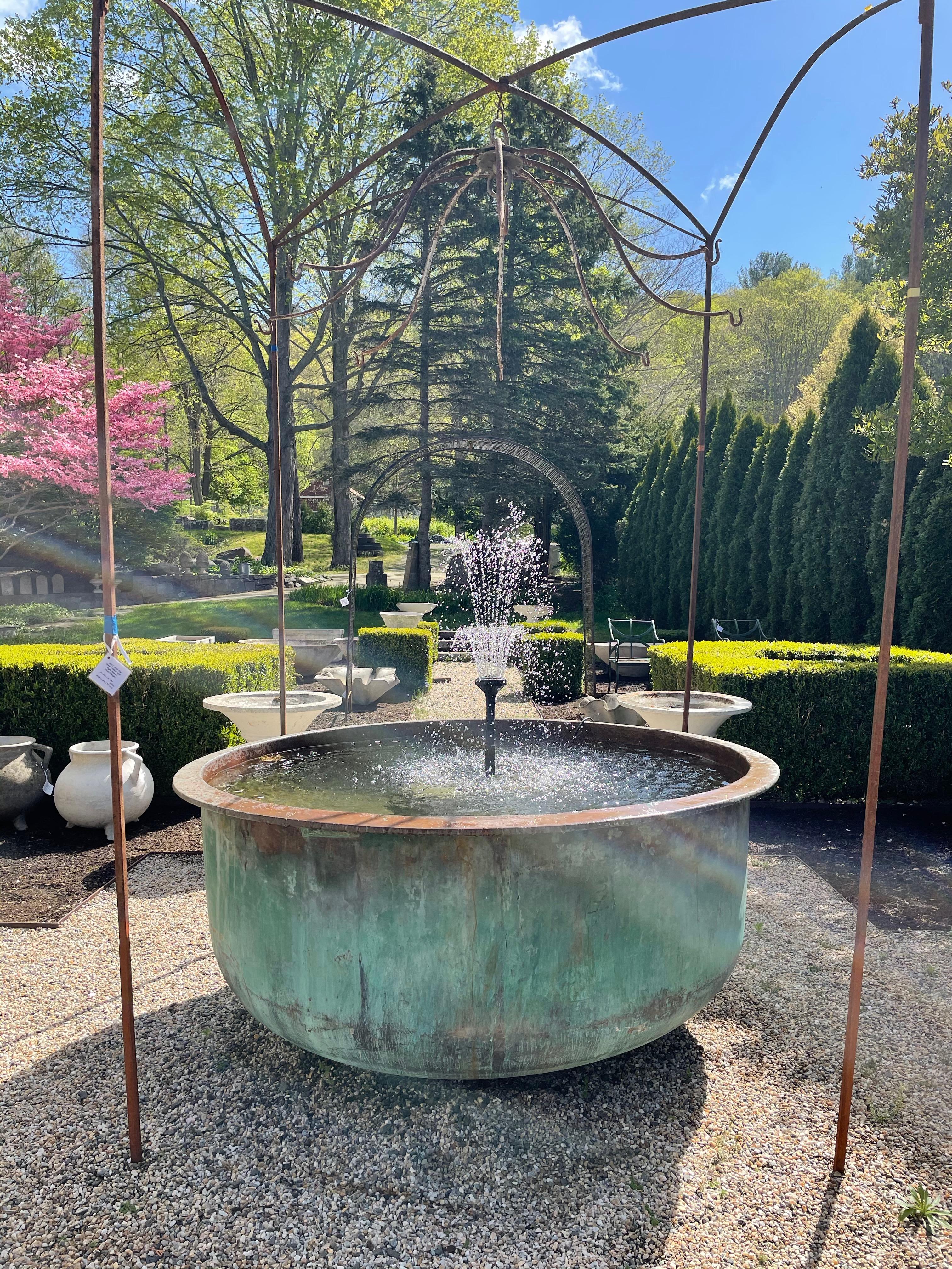 We adore copper cheese vats, particularly since they make such exceptional garden focal points and can serve as fountains, planters, hot tubs or fire pits. This one is stunning and features a sensational all-natural verdigris patina that can only be