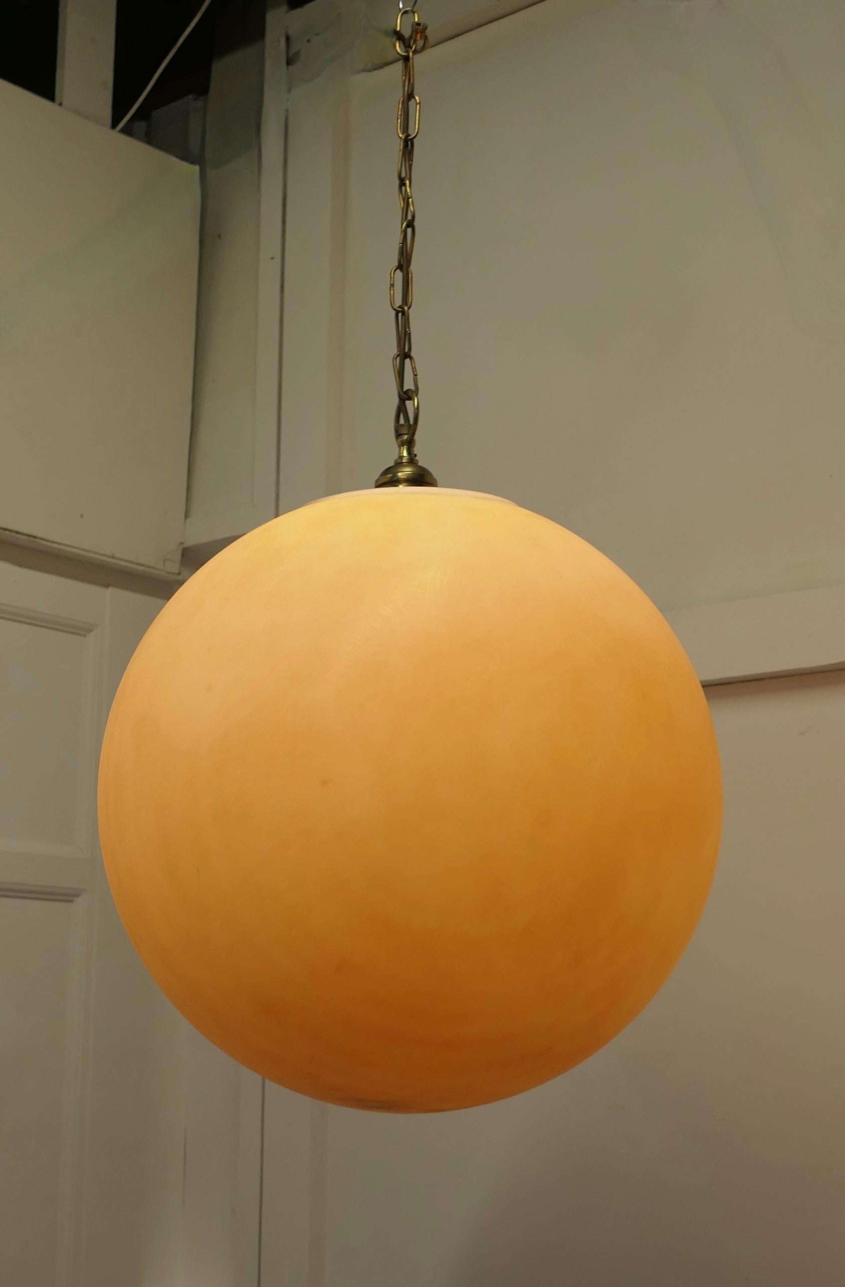 Huge French Mid Century Psychedelic SUN Ceiling Light

This is a really large piece, when seen alight it looks just like the sun, it has an orange tinge when alight and a paler version without 
The Globe is nearly 2 feet across it is made in perspex