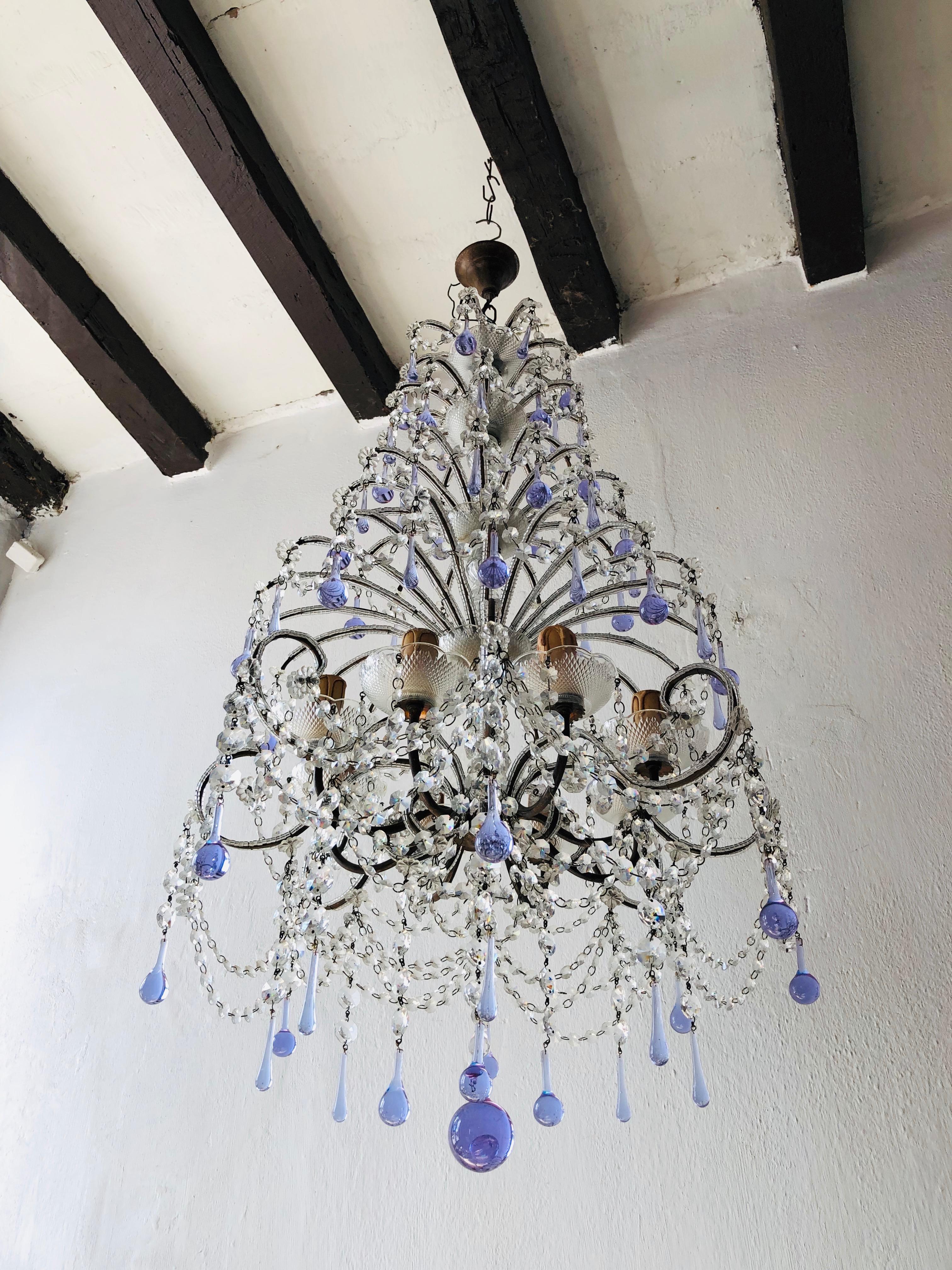 Housing 8 lights, crystal bobeches, dripping with crystal prisms. Rewired and ready to hang. Tiers of beaded arms dripping with two sizes of lavender Murano drops, swags of Swarovski crystals. Huge lavender ball as finial. Re-wired and ready to