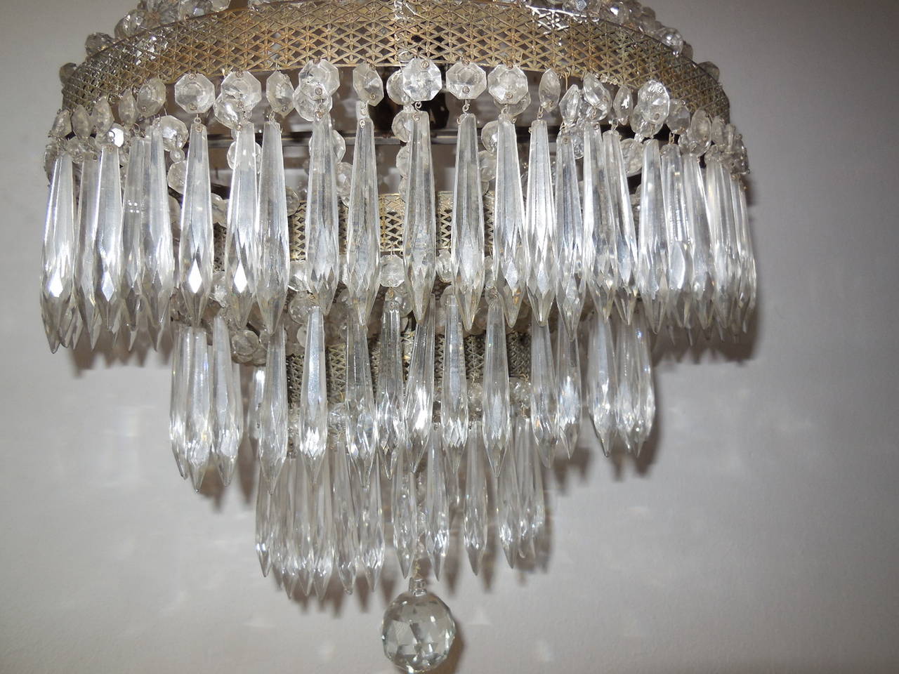 Early 20th Century Huge French Oval Crystal Prisms Tiered Chandelier For Sale