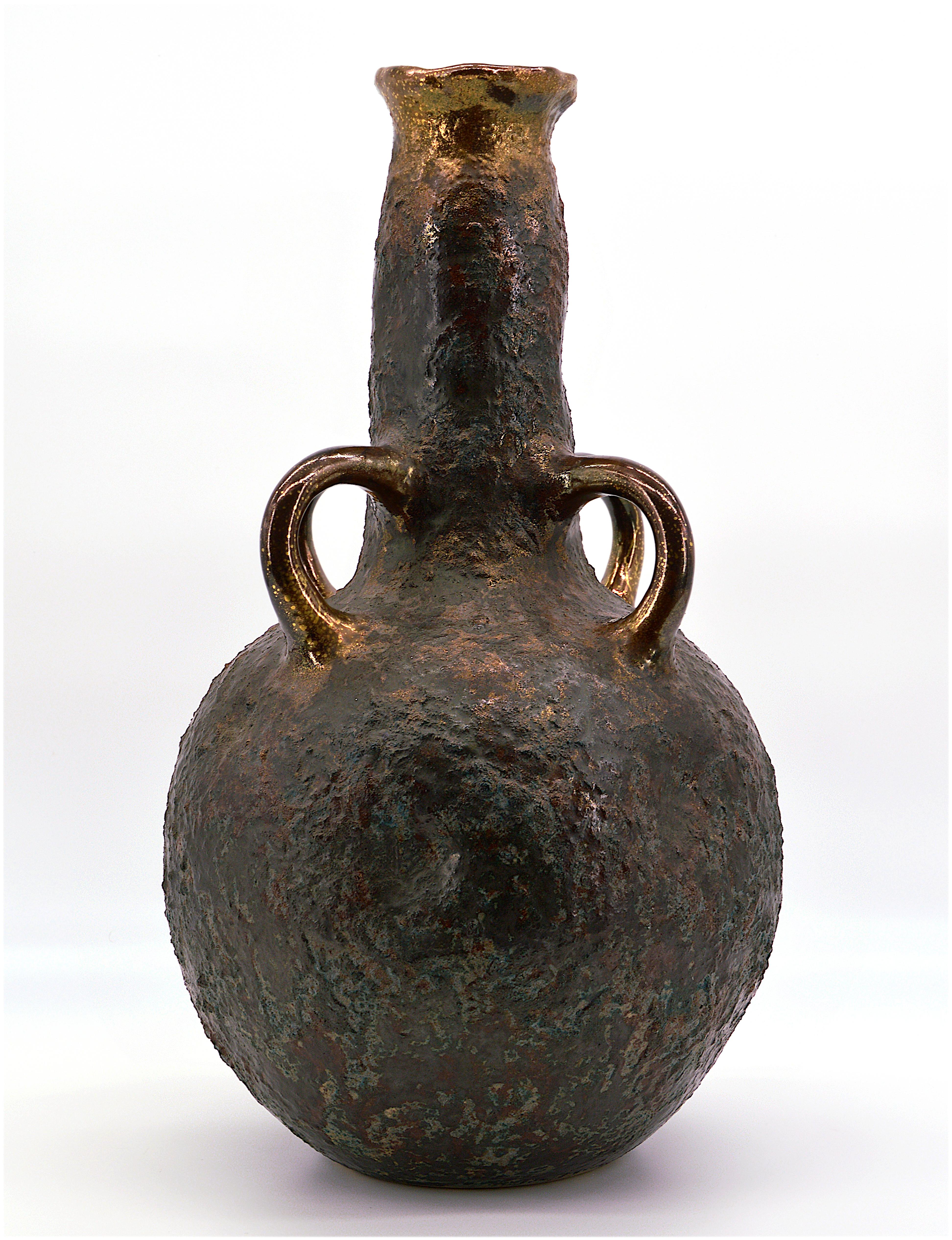 Large and spectacular French stoneware vase, France, 20th century large and spectacular vase with four handles. Thick stoneware with metal oxides. Great effect! Measures: Height 49 cm, 19.3 in., diameter 27 cm, 10.6 in.