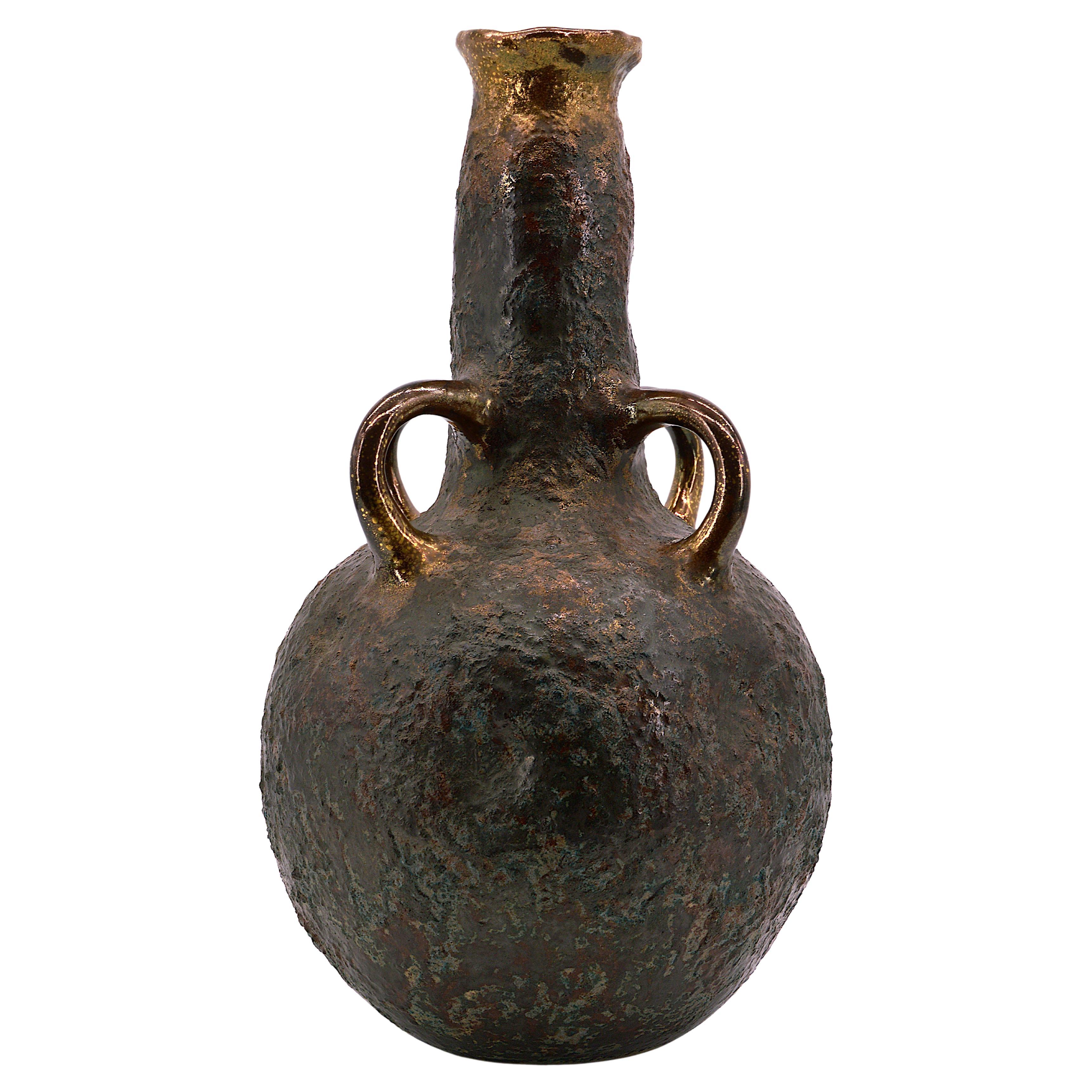 Large and Spectacular French Stoneware Vase, France, 20th Century. This stunning French stoneware vase, created in the 20th century, is a remarkable piece. Its bold design features four handles and is made from thick stoneware enriched with metal