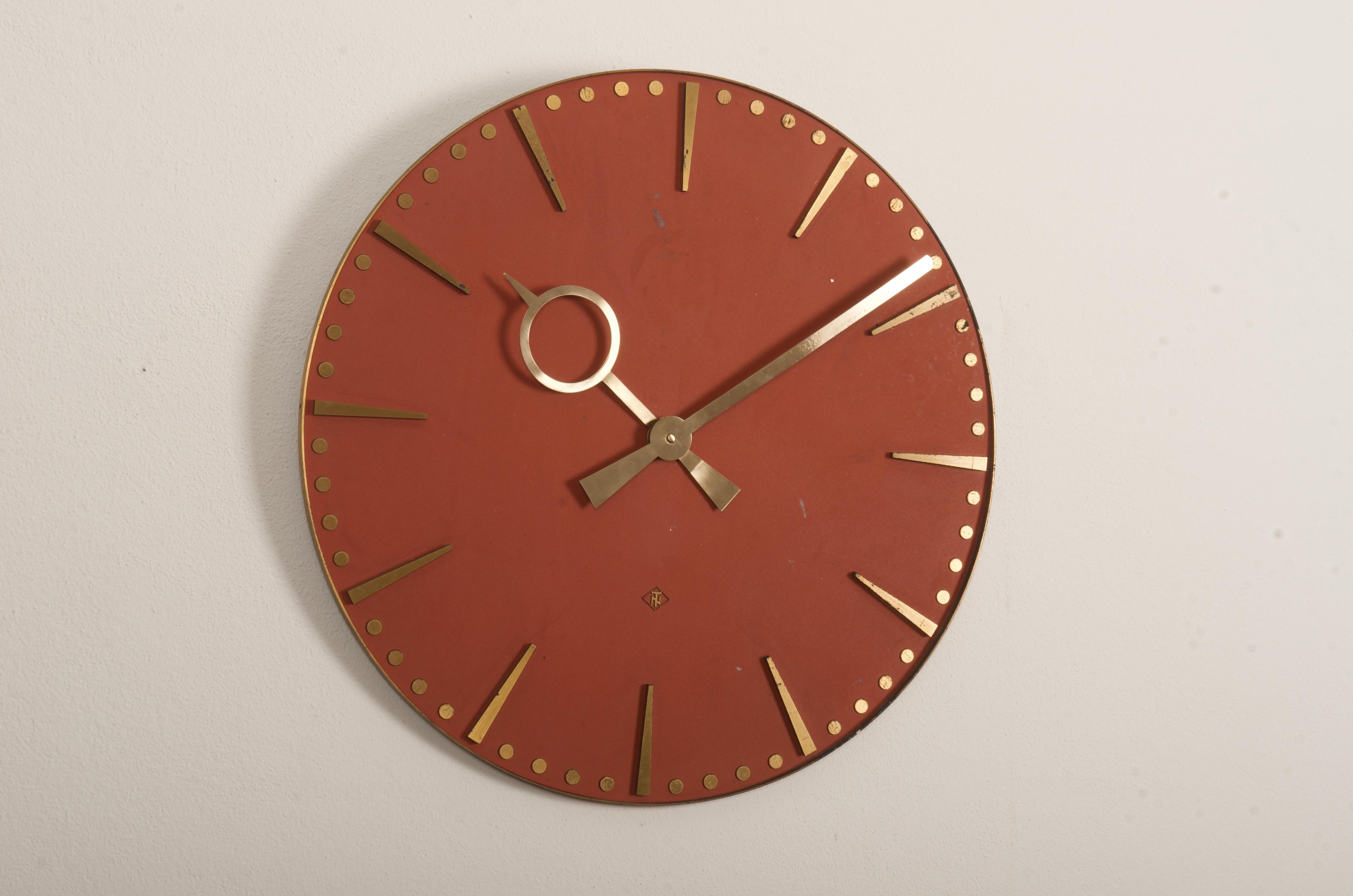 Brass frame and brass hands made by TN Telenorma in the late 1960s.
Formerly an office or factory slave clock, it is now fitted with a modern quartz movement with an AAA battery.
Some patina on brass.
 