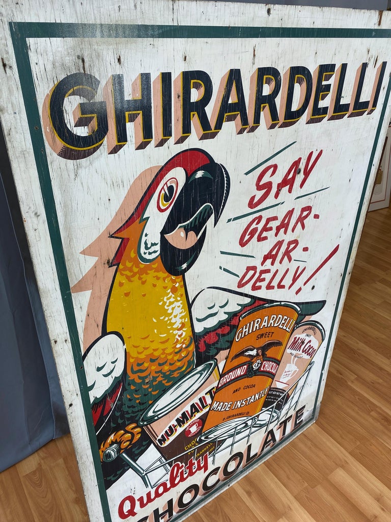 Hand-Painted Huge Ghirardelli Chocolate Parrot Mascot Painted Wood Advertising Sign, 1930s For Sale