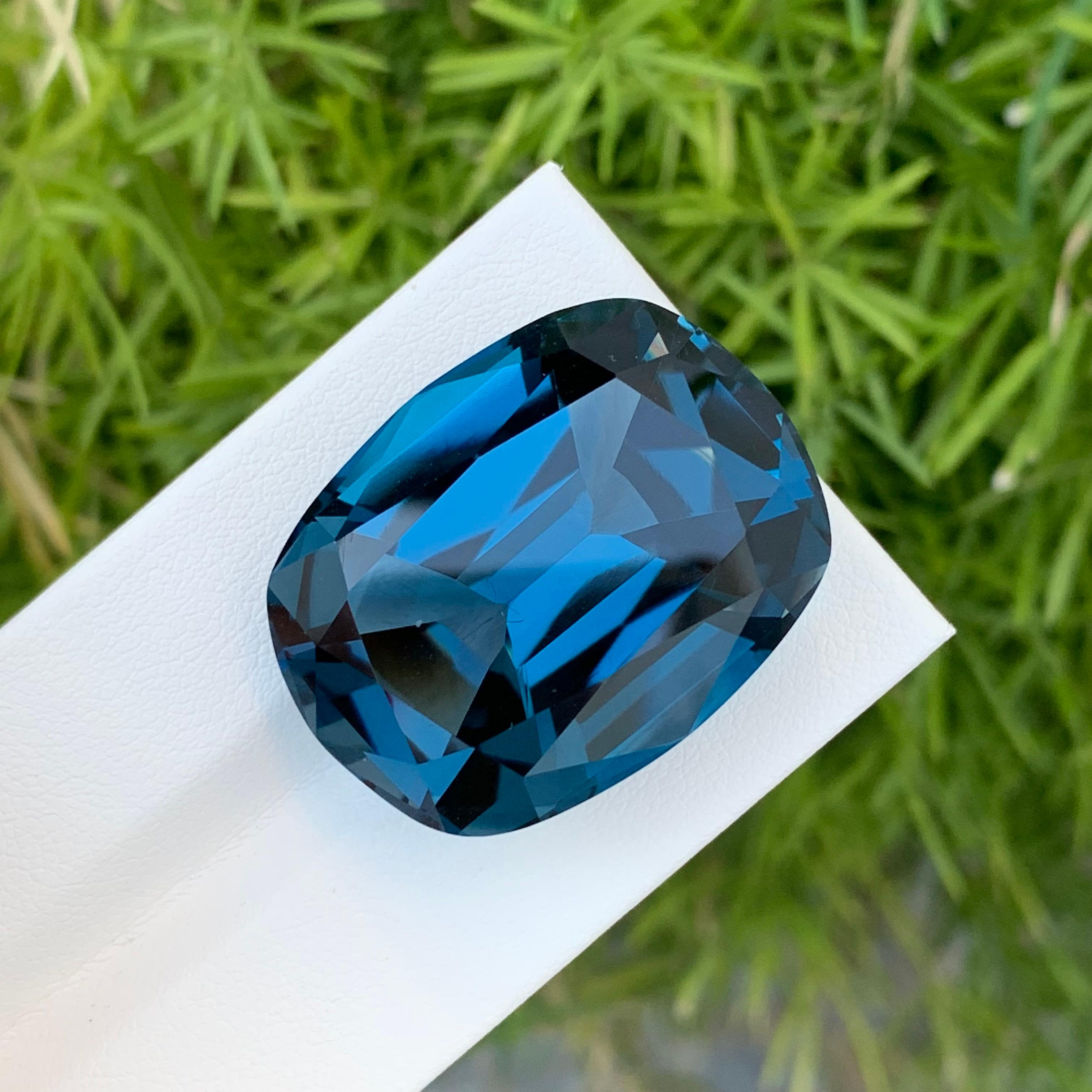 Loose London Blue Topaz

Weight: 77.15 Carats
Dimension: 29 x 22 x 14.9 Mm
Origin: Brazil
Shape: long Cushion 
Color: Deep Blue
Certificate: On Customer Demand

London Blue Topaz is a mesmerizing variety of topaz renowned for its deep and enchanting