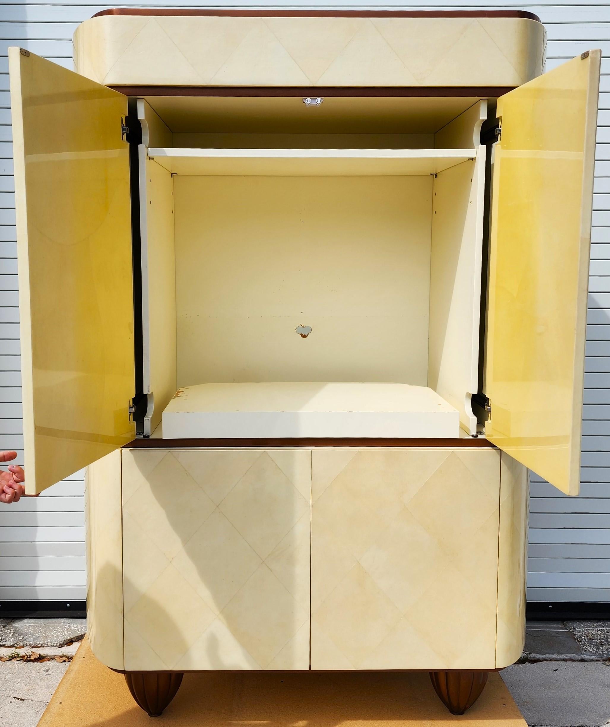 For FULL item description click on CONTINUE READING at the bottom of this page.

Offering One Of Our Recent Palm Beach Estate Fine Furniture Acquisitions Of A
Huge Vintage Dry Bar Cabinet Custom Made by Jimeco
Featuring bleached Goatskin leather
