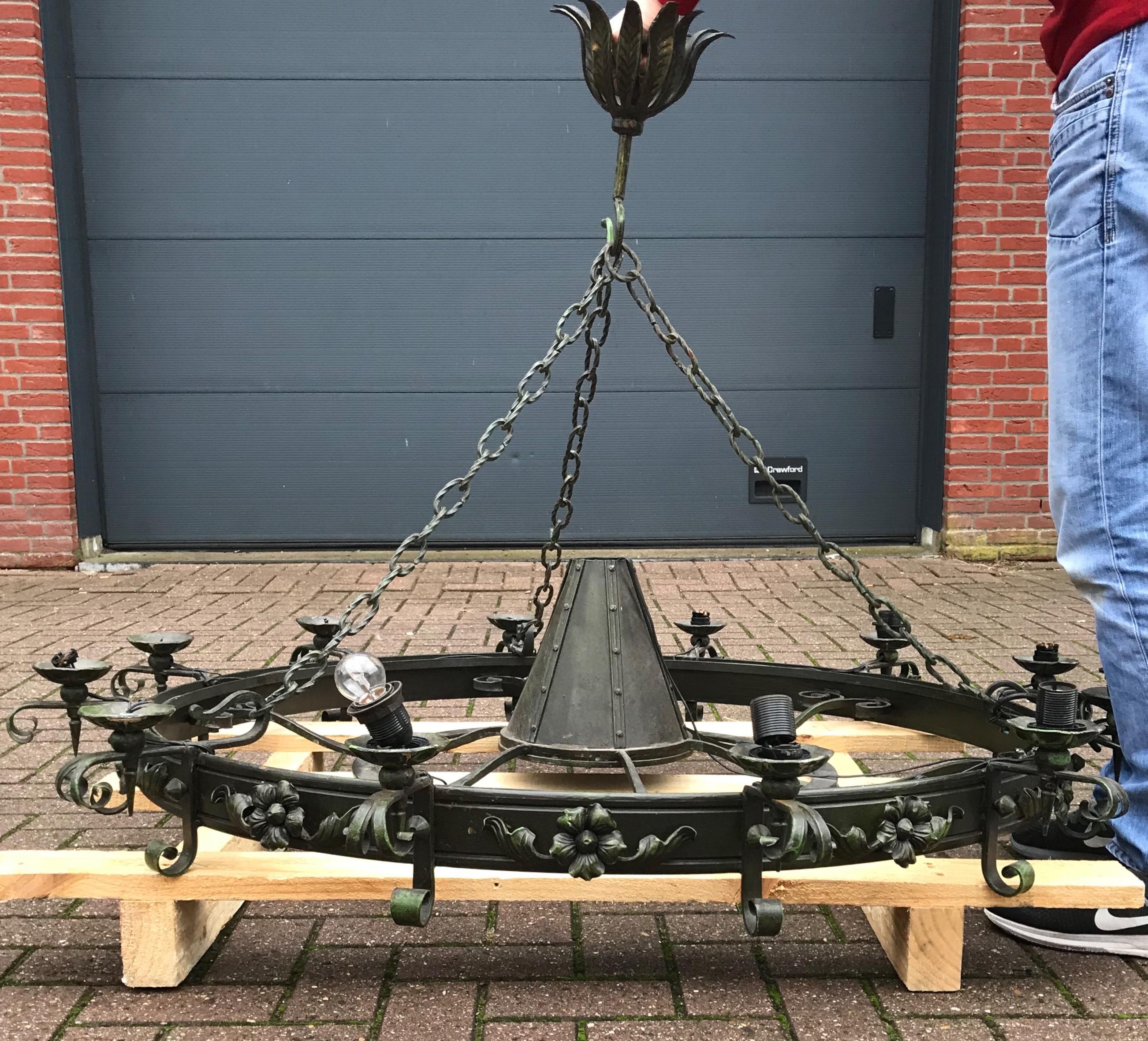 Enormous Crafted Wrought Iron Chandelier w. 12 Torch Lights and One Centre Light For Sale 2