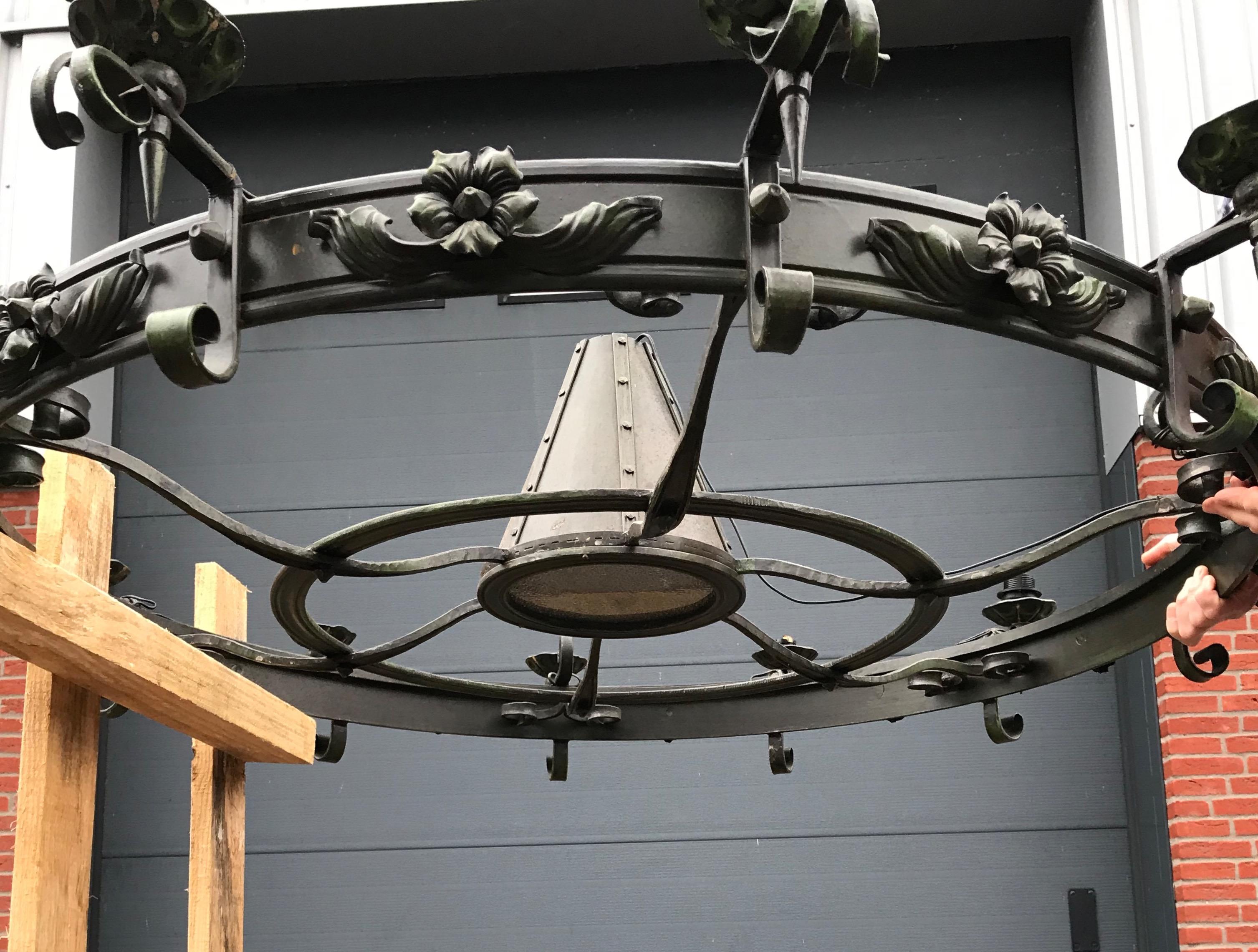 Enormous Crafted Wrought Iron Chandelier w. 12 Torch Lights and One Centre Light For Sale 3