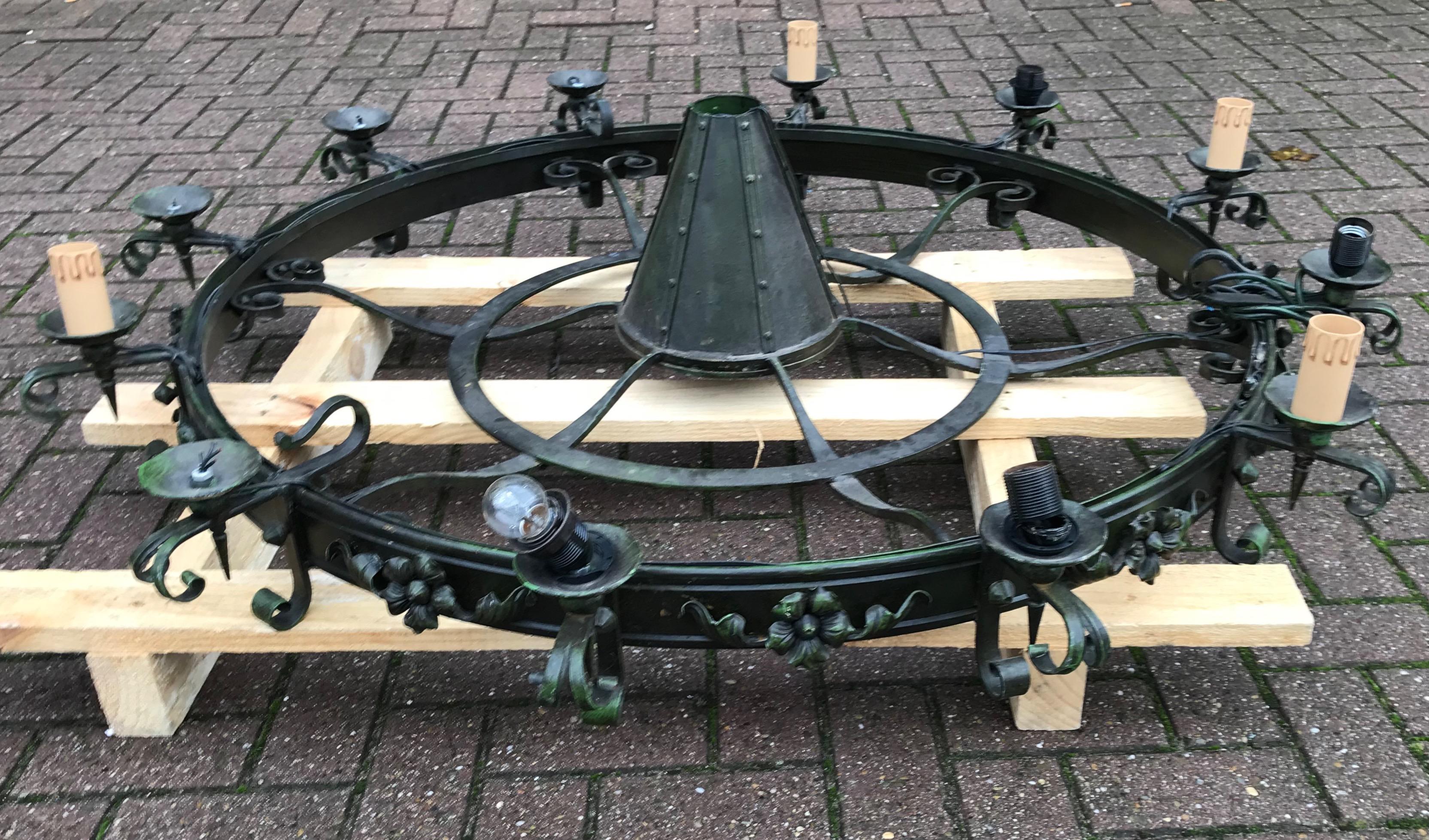 Enormous Crafted Wrought Iron Chandelier w. 12 Torch Lights and One Centre Light For Sale 4