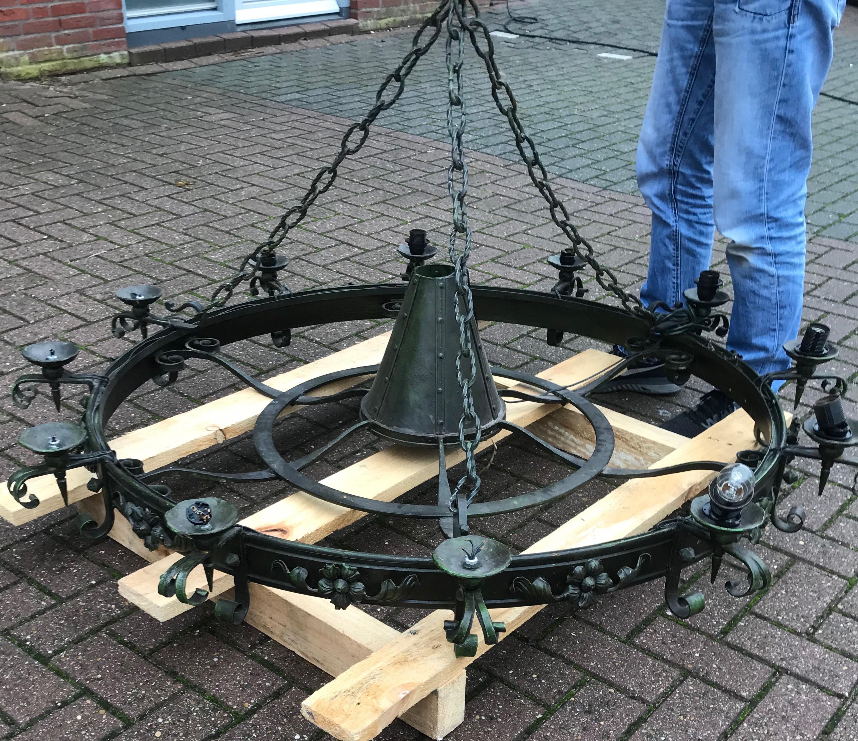 Enormous Crafted Wrought Iron Chandelier w. 12 Torch Lights and One Centre Light 11