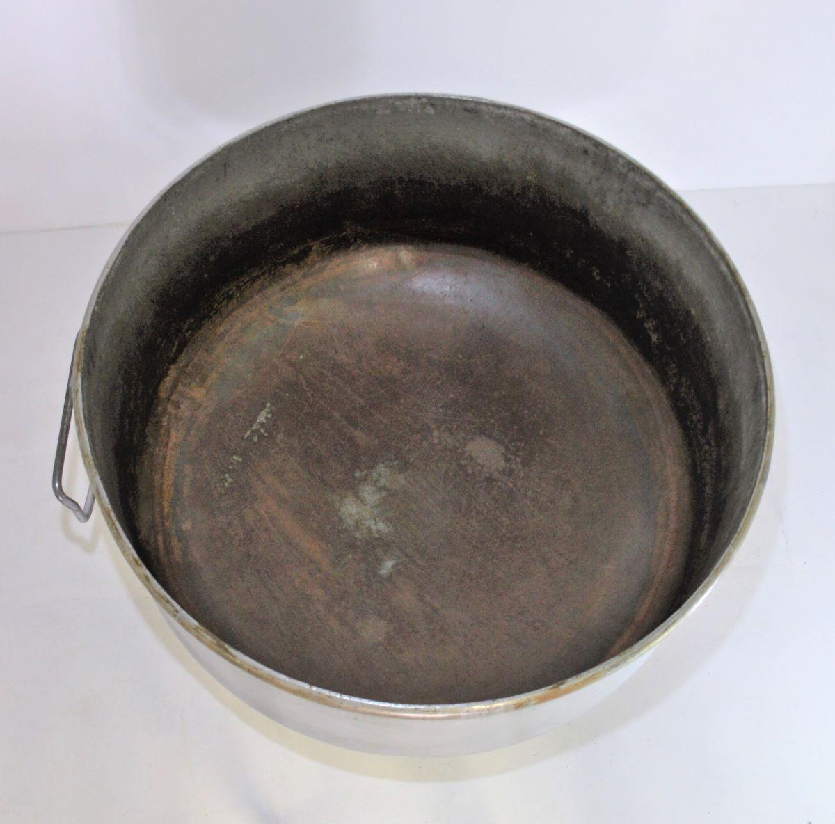 A very large industrial bakery mixing bowl on a heavy cast iron frame with castors.
This came from an old bread making bakery in Wales where it was used to mix dough for over 60 years. A great piece of heavy industrial history which will live on as