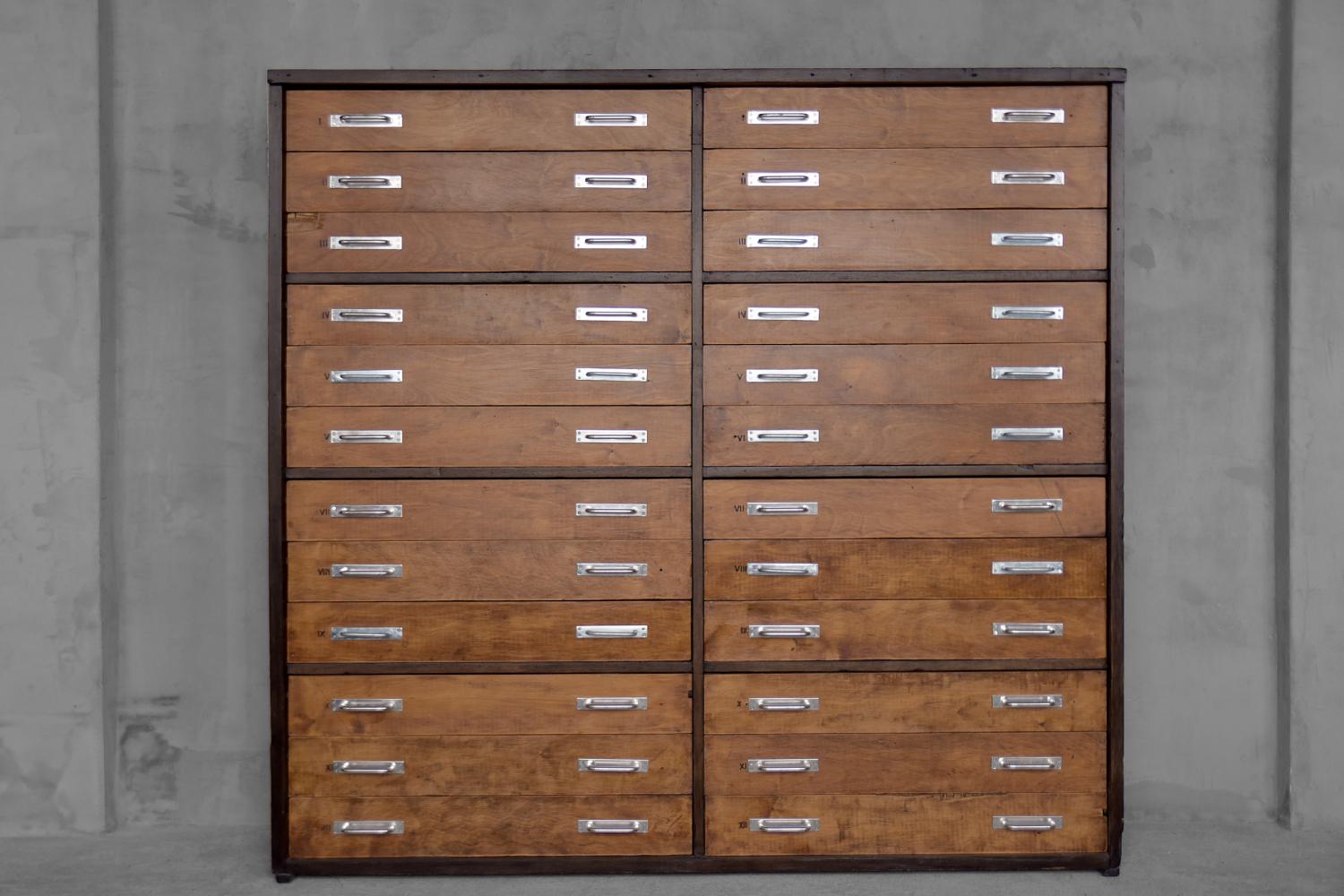 This huge drawer cabinet was manufactured in Austria during the 1930s. It is made of three kinds of wood: oak, elm and hornbeam. Oak wood is considered a royal material for a reason - even after several centuries, furniture made of oak looks like