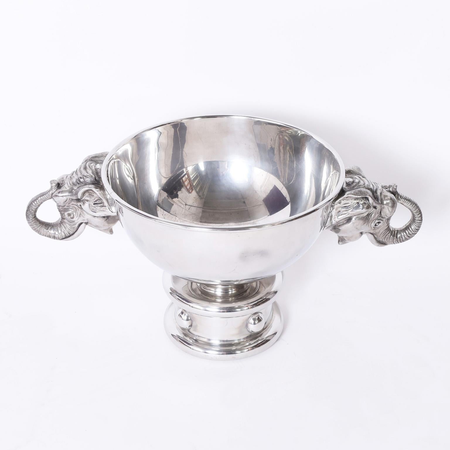 Rare and remarkable extremely large Art Deco Italian champagne, wine or ice bucket crafted in silver plate over pewter with elephant head handles over a classic 1930s style base. Designed by Piero Figura for Atena.