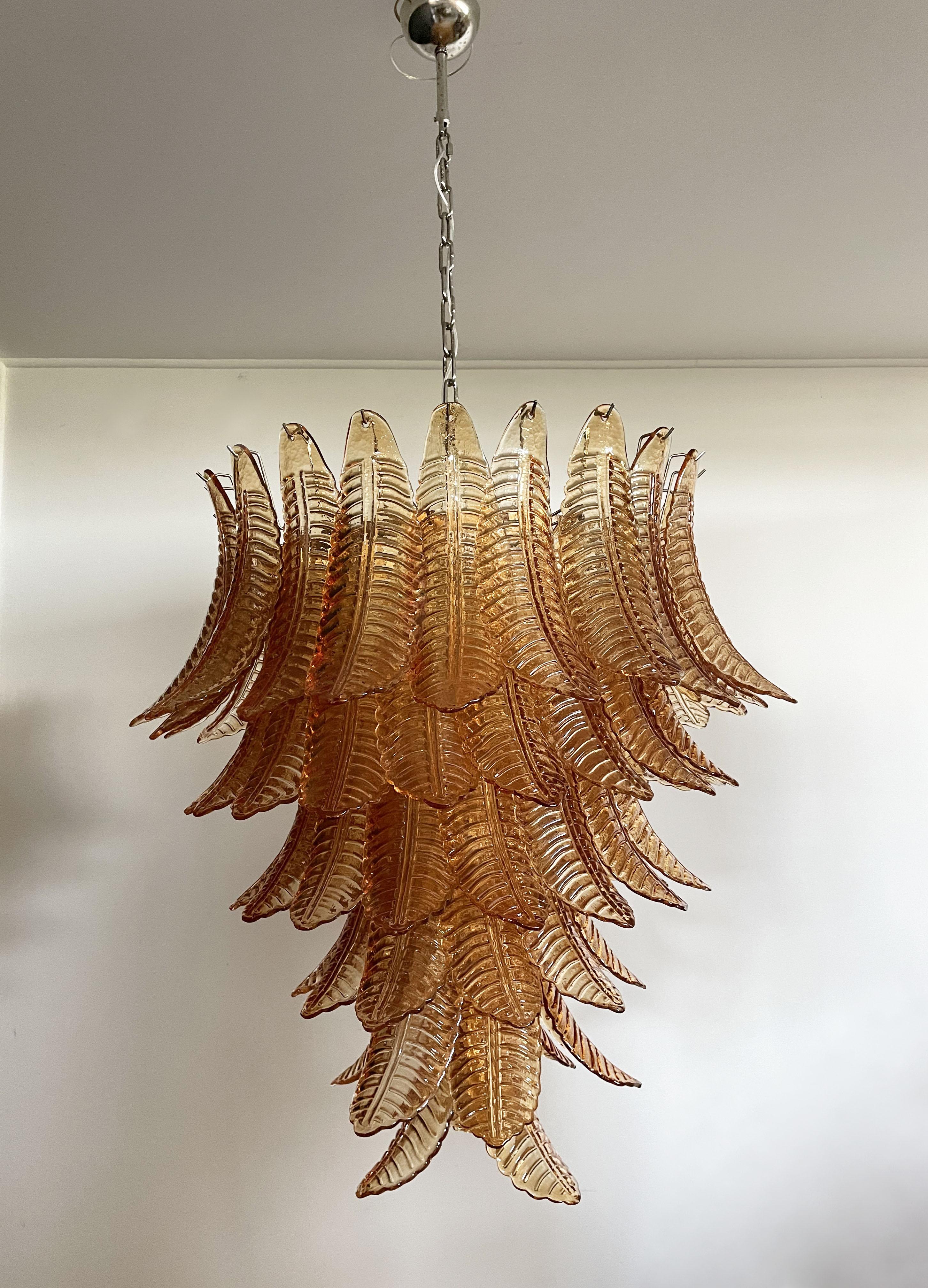 Beautiful and huge Italian Murano Chandelier composed of 75 splendid amber glasses that give a very elegant look. The glasses of this chandelier are real works of art.
Dimensions: 65.90 inches (170 cm) height with chain; 38.75 inches (100 cm)