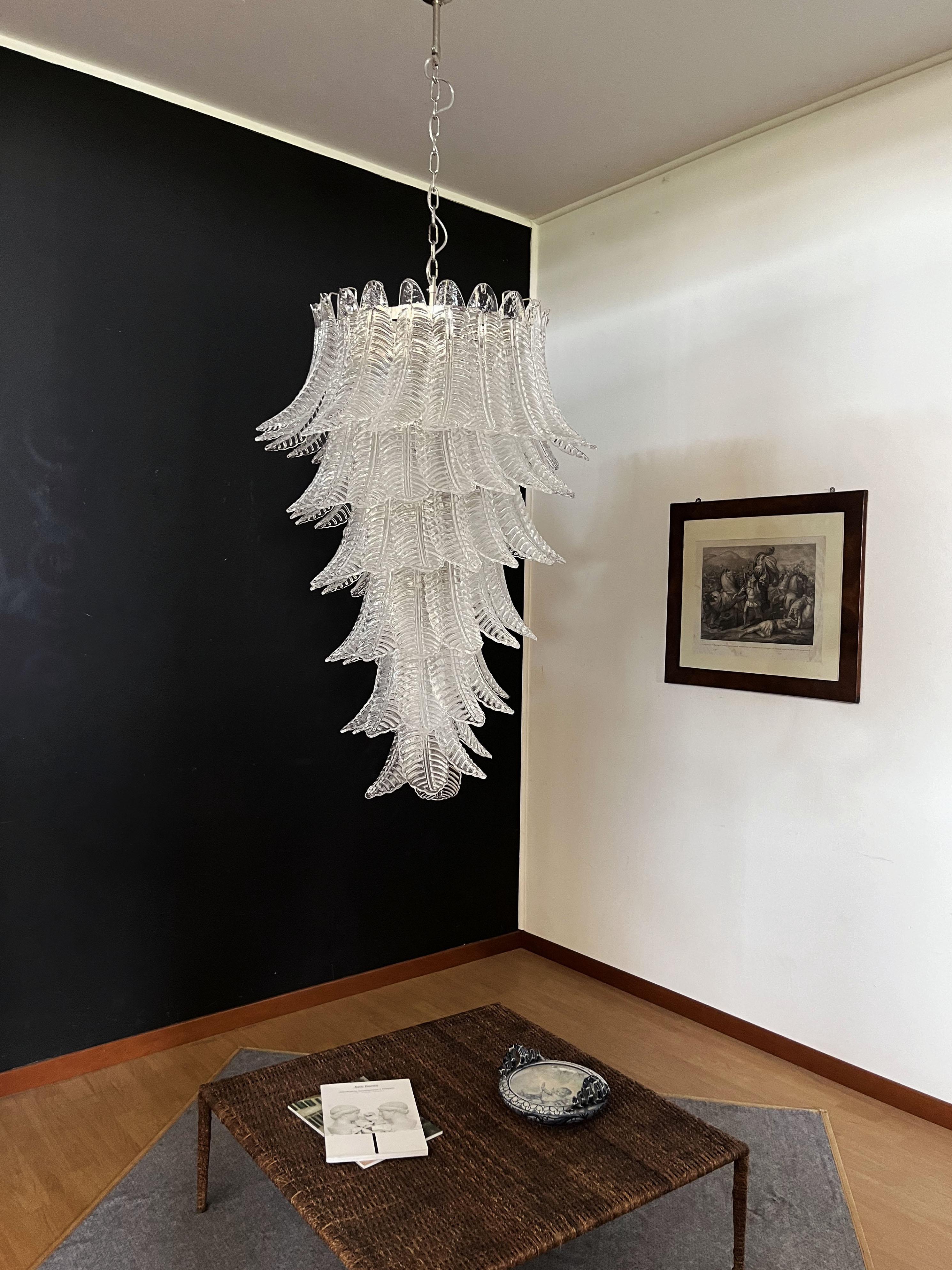 Beautiful and huge Italian Murano Chandelier composed of 83 splendid clear glasses that give a very elegant look. The glasses of this chandelier are real works of art. The glasses descend with a spiral shape.
Dimensions: 71,70 inches (185 cm)