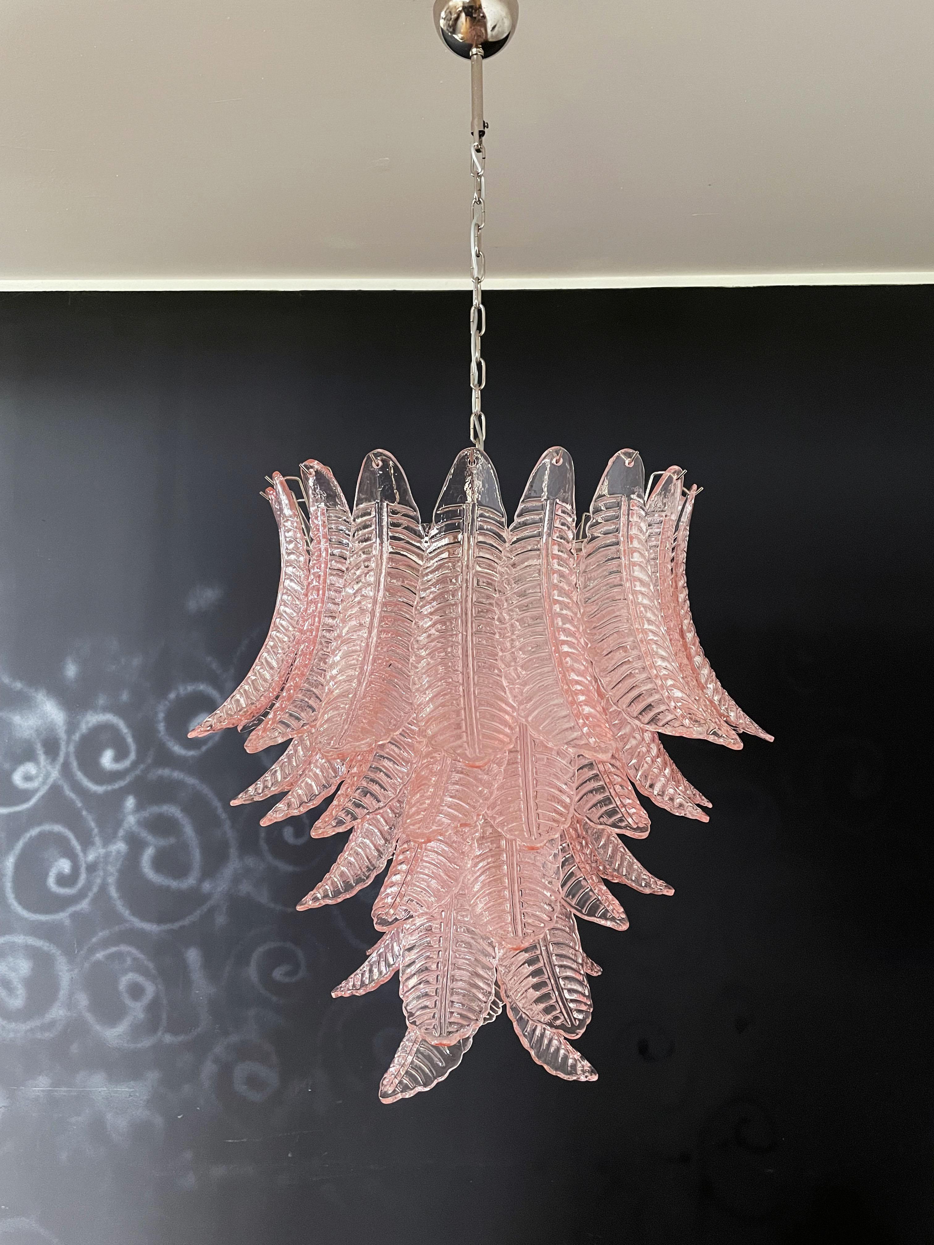 Beautiful and huge Italian Murano chandelier composed of 52 splendid pink glasses that give a very elegant look. The glasses of this chandelier are real works of art, the weight of this chandelier is 45 kg.
Period: 1980's
Dimensions: 61 inches (155