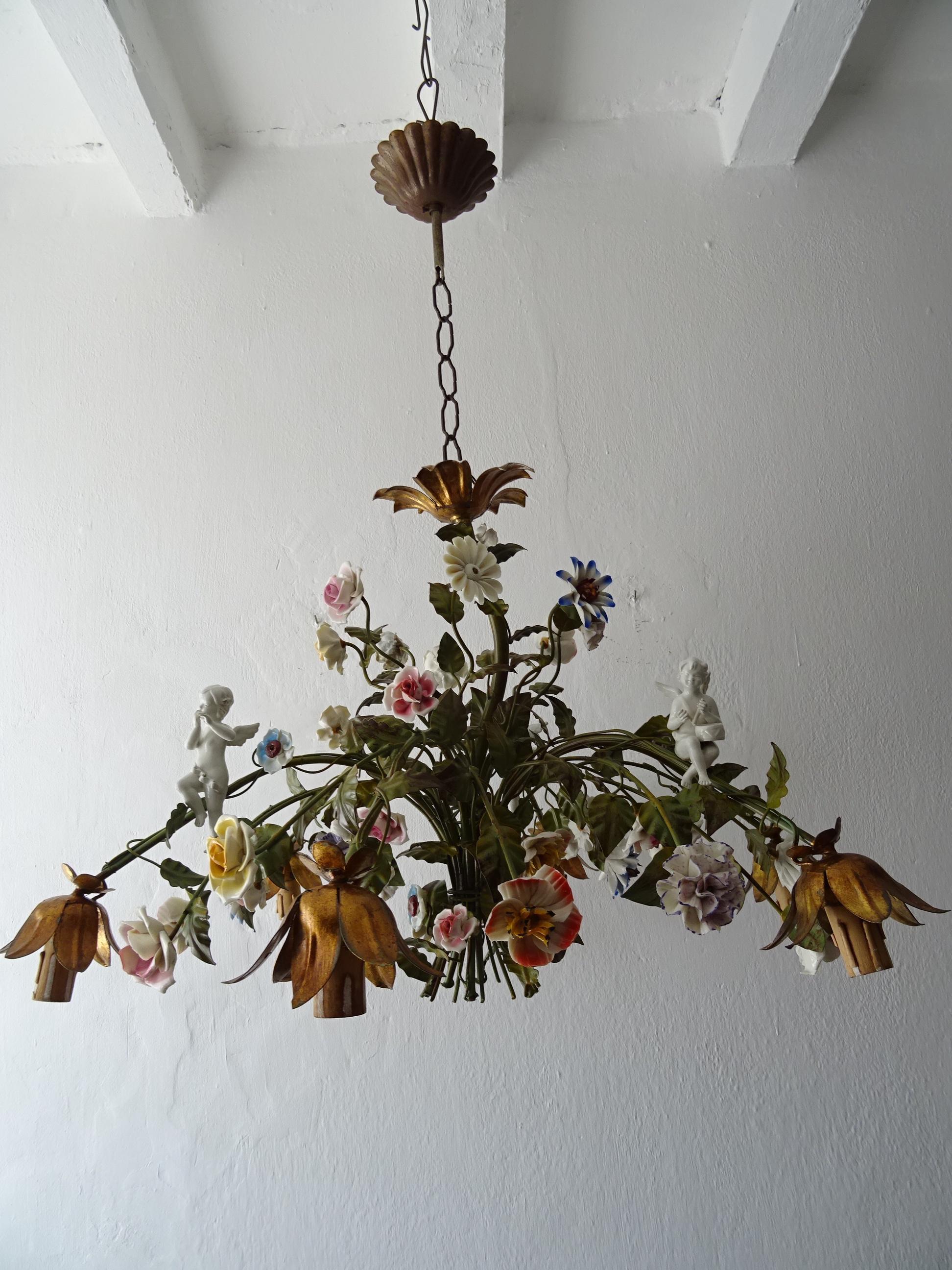 Housing 6 lights, pointing down. Will be newly rewired with certified UL US sockets for the United States and appropriate sockets for all other countries and ready to hang. Original color tole with gold bulb holders. Rare big size. Adorning 3