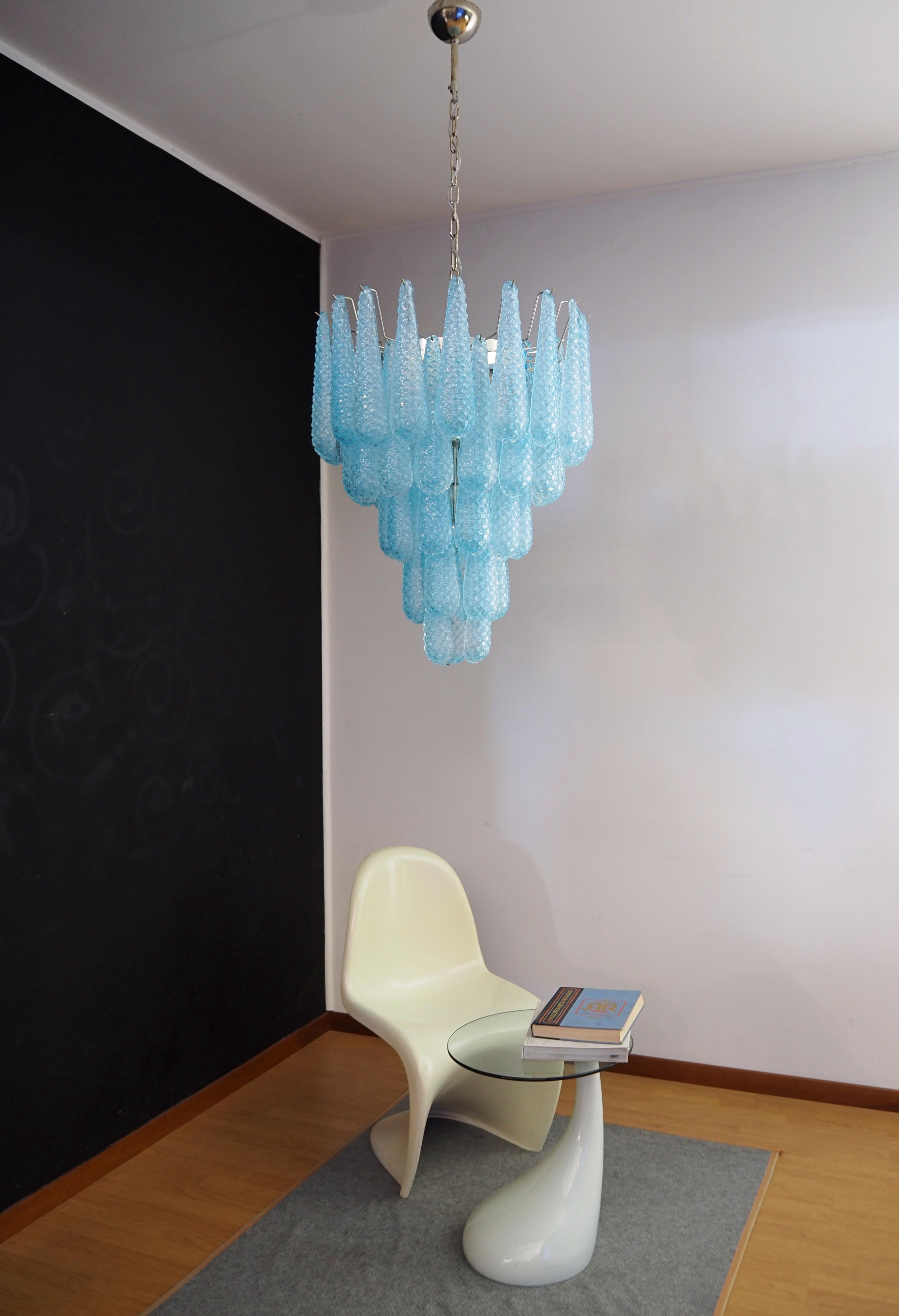 Huge Italian vintage Murano chandelier made by 52 glass petals (BLUE crystal, smooth outside, with crystal powder and then rough inside.) in a chrome frame.
Period:  late XX century
Dimensions:  55,10 inches (140 cm) height with chain; 29,50 inches