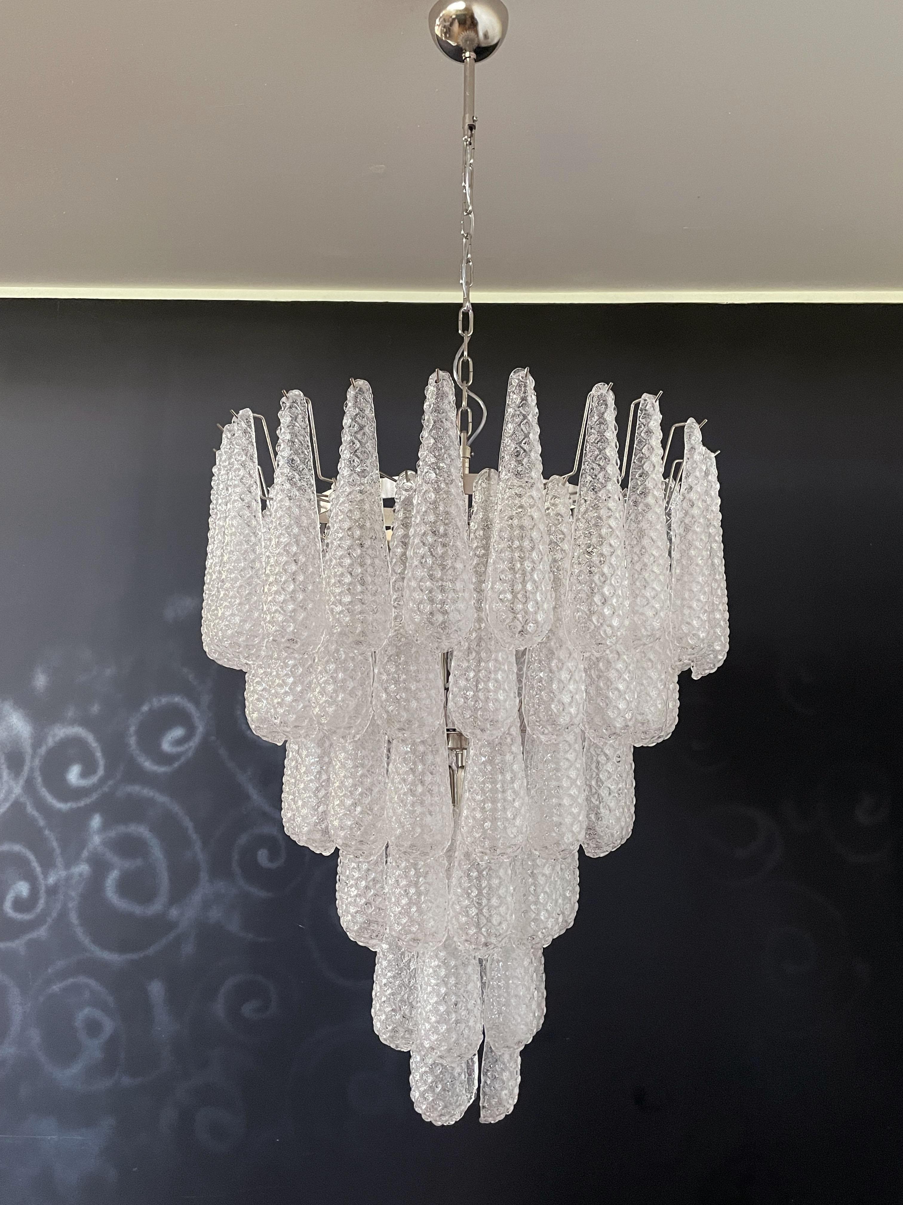 Gorgeous Italian vintage chandelier made from 75 great hourglass Murano glass. Nickel plated metal frame.
Period: late XX century
Dimensions: 65 inches (165 cm) height with chain; 37,40 inches (95 cm) height without chain; 29,50 inches (75 cm)