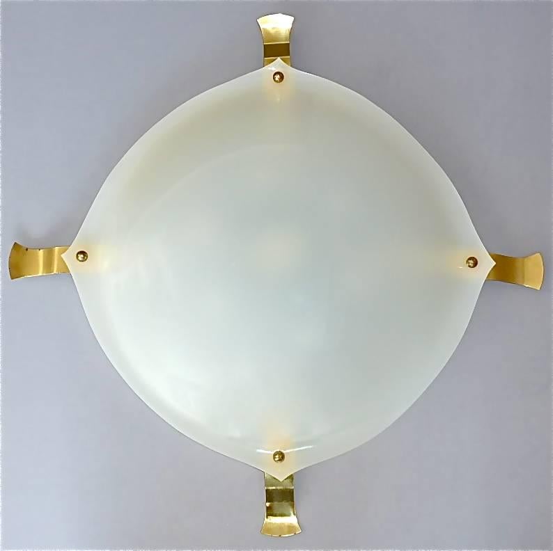 Huge Italian midcentury white plastic and patinated brass flush mount executed in the 1950s with attribution to one of the famous companies and designers Angelo Lelii for Arredoluce, Stilnovo or Arteluce. The ceiling lamp is made of opaque white