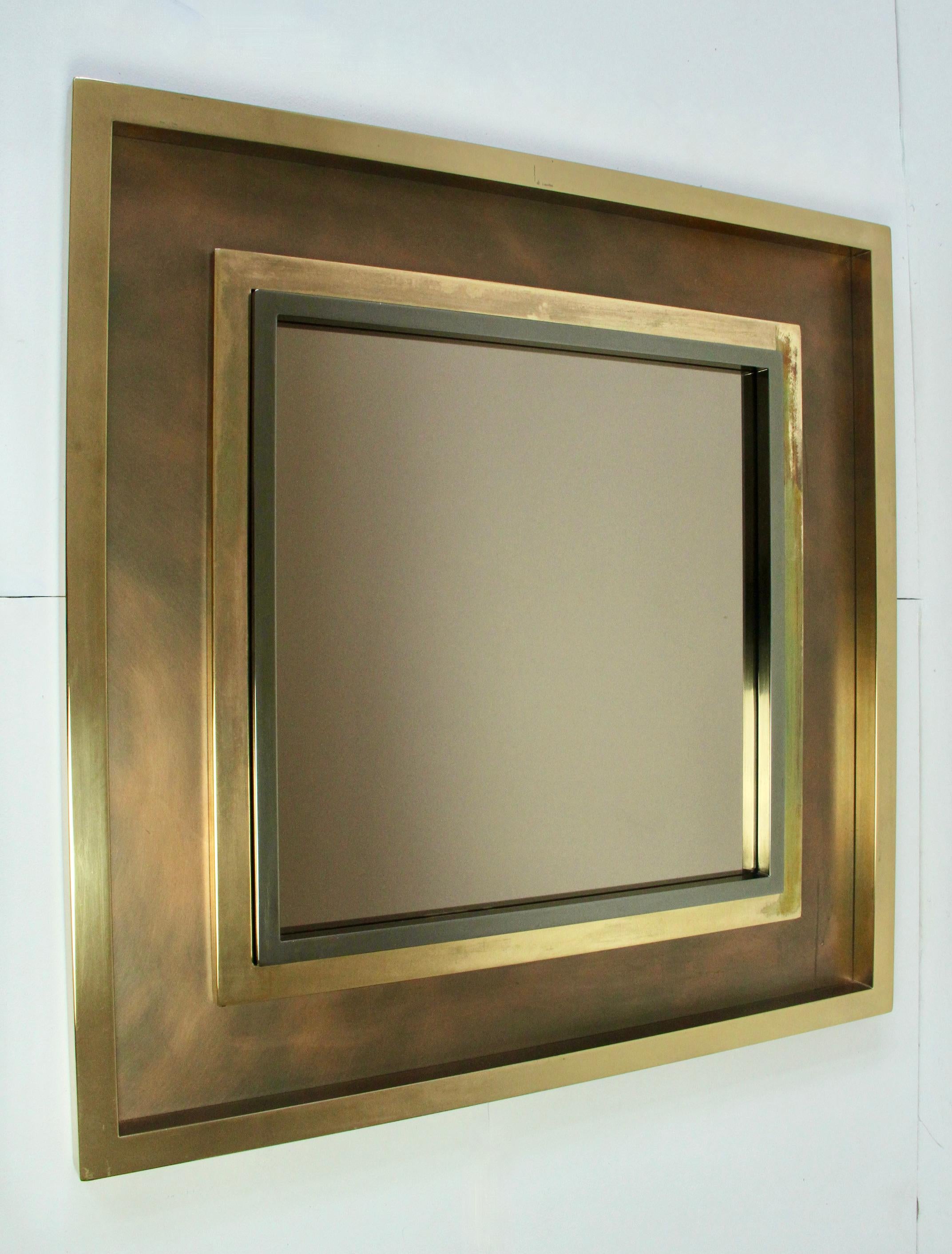 Stunning, large and very rare square midcentury brass, brushed patinated copper & gunmetal wall-mounted / hung vanity or hallway mirror by the Vereinigte Werkstätten (United Ateliers), Germany, circa 1960-1980. Often mis-attributed to the French