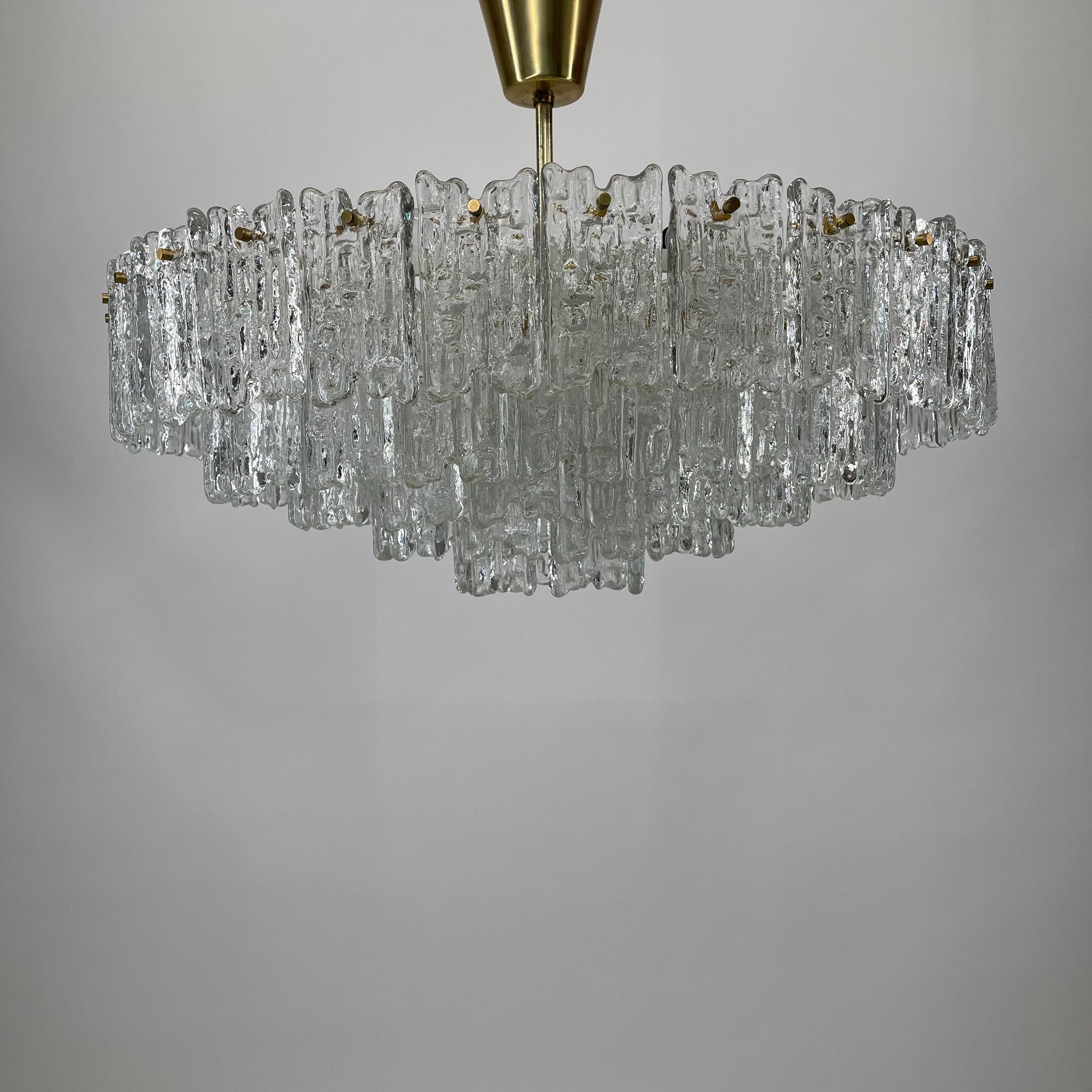 Huge J.T. Kalmar chandelier Ripple Glass, Austria 1960s. 66 Ripple-Glass plates with 21 light bulbs.
