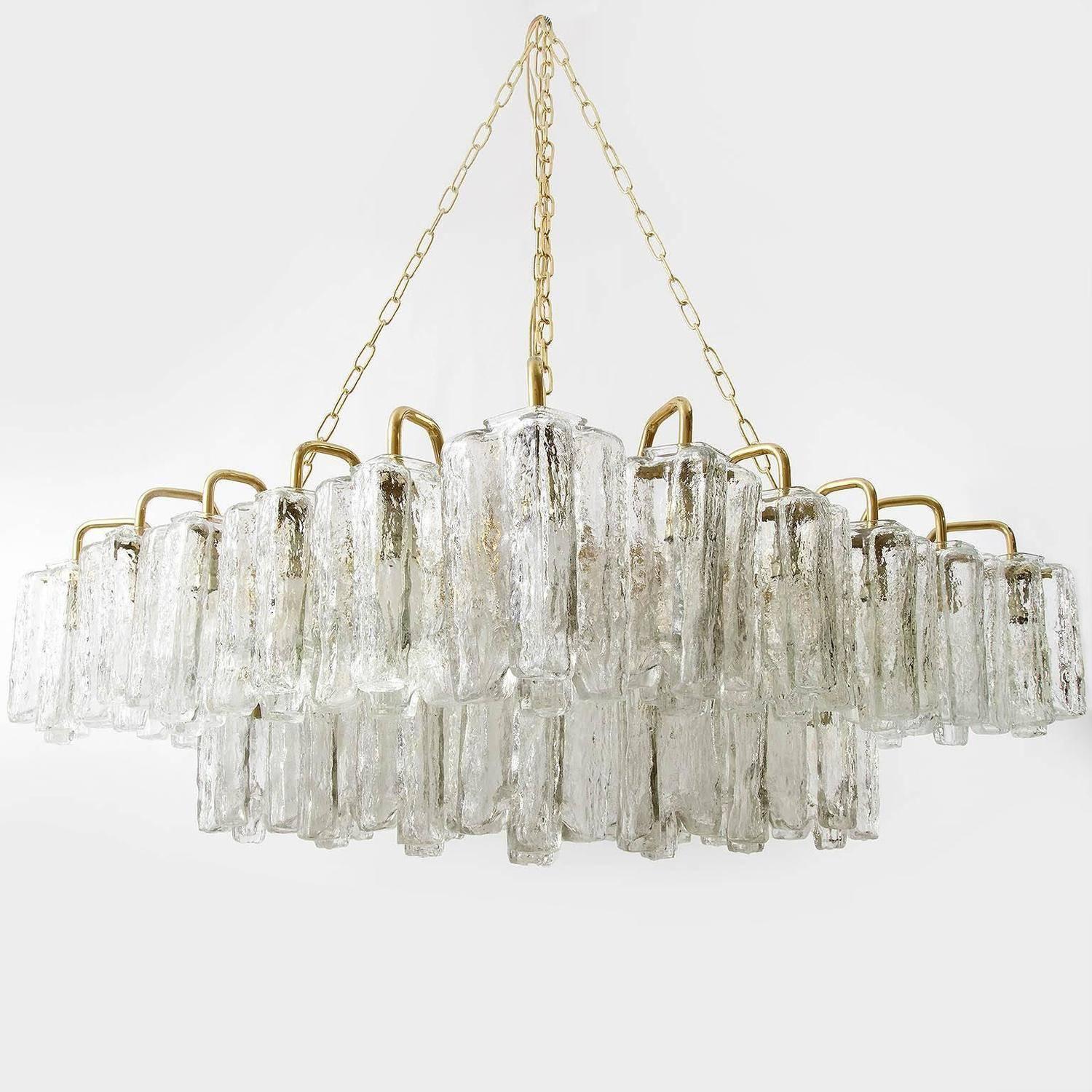 One of four square and extra large 'Granada' (engl. 'Grenada') light fixtures by J.T. Kalmar, Austria, manufactured in midcentury, circa 1970 (late 1960s or early 1970s).
The lamps can be used as pendant light / chandelier or as flushmount light